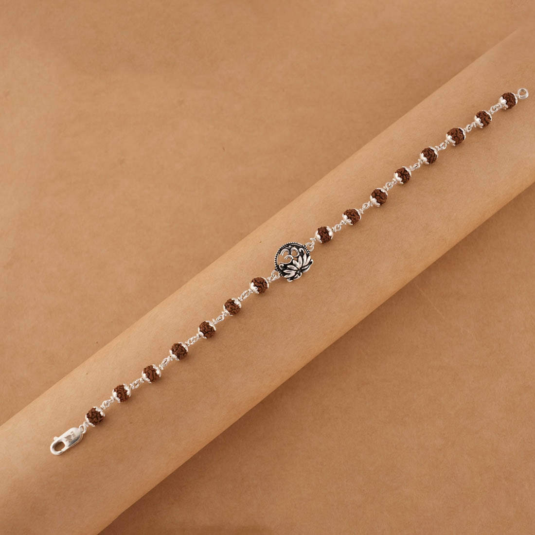 Prinjal Jewellers Silver Rakhi with Om and Lotus Flower and Single Line Rudraksha for Men - view 4