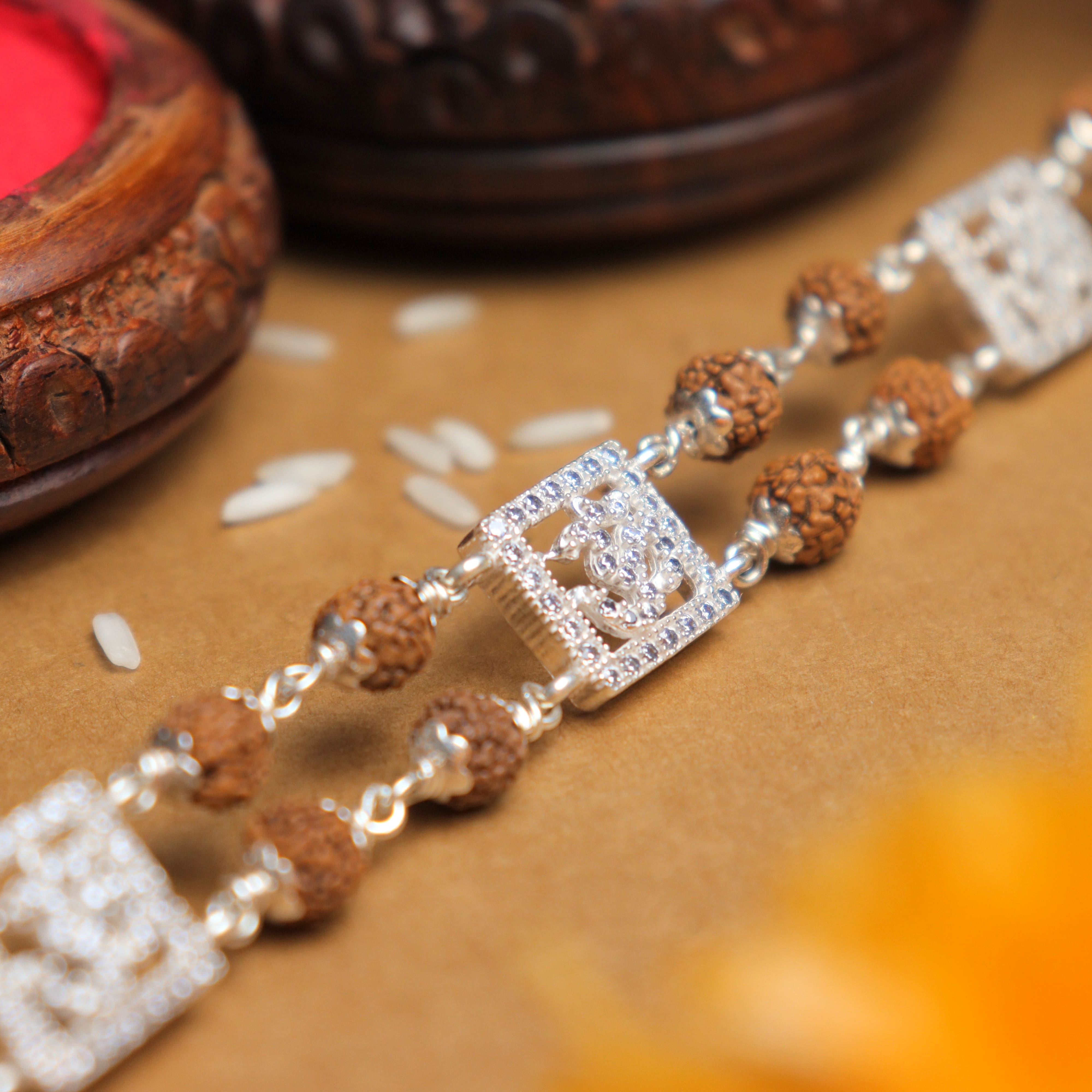 Prinjal Jewellers Silver Rakhi with Rudraksha and Three Om, Double Line Design