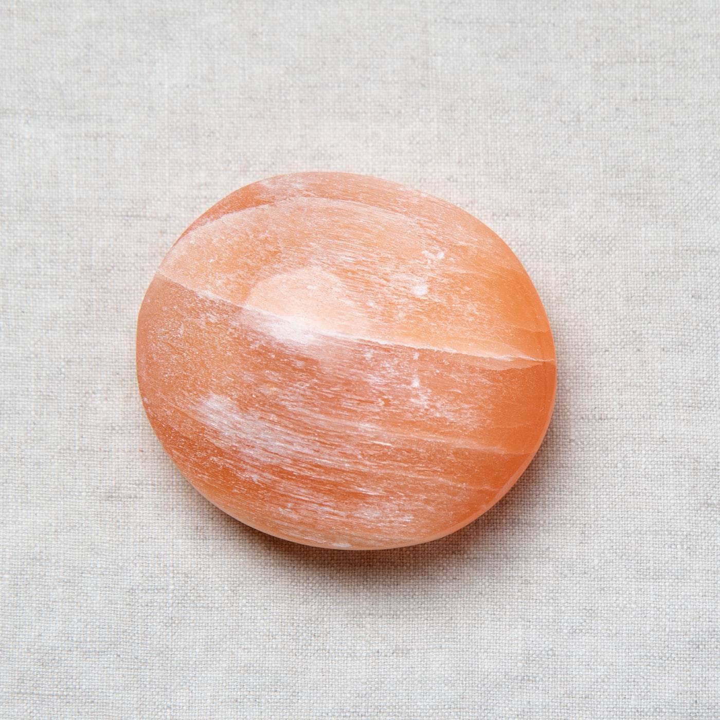 Tiny Rituals Peach Selenite Palm Stone