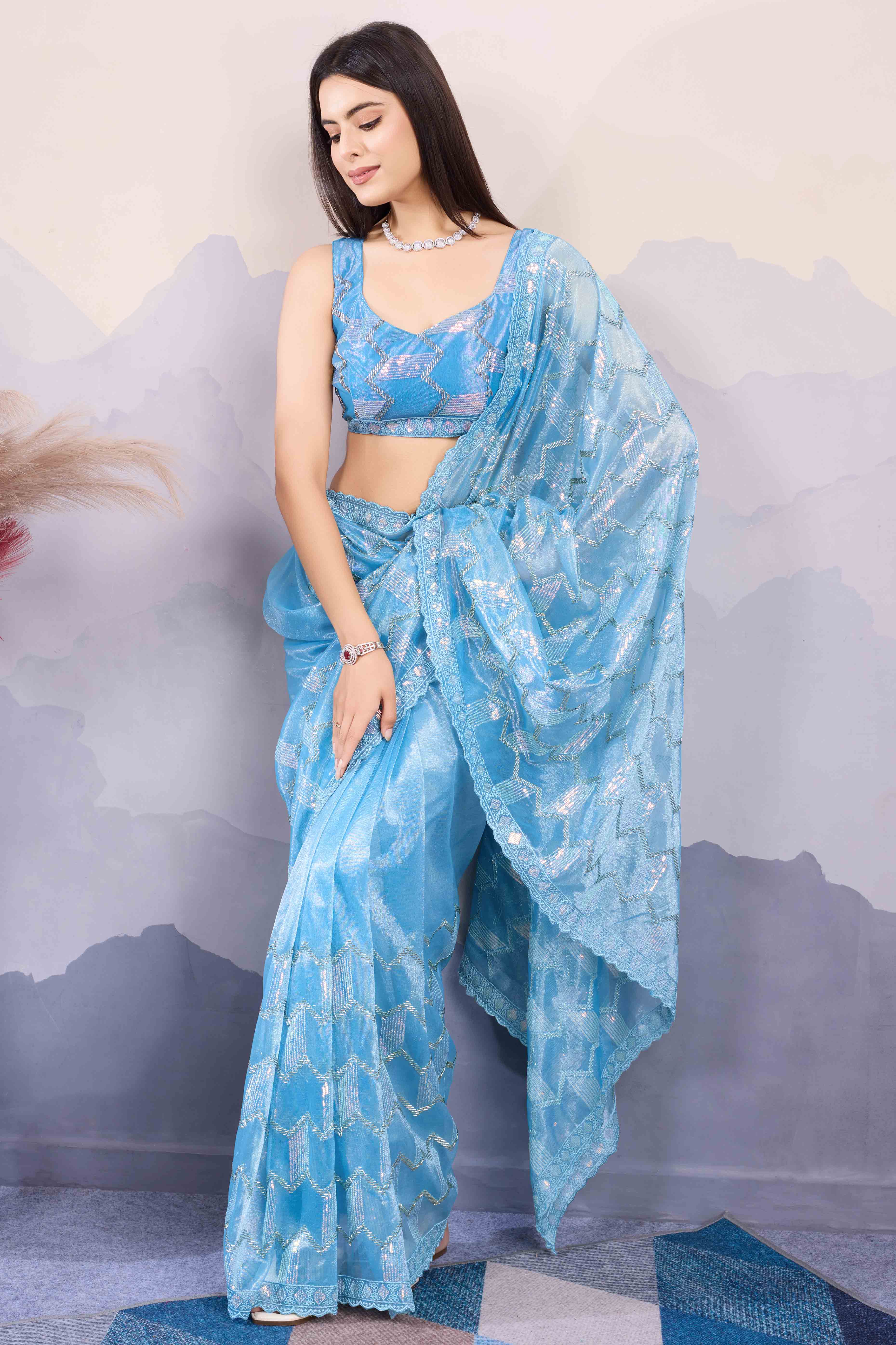 Peachmode Blue Sequins Embroidered Twill Net Saree