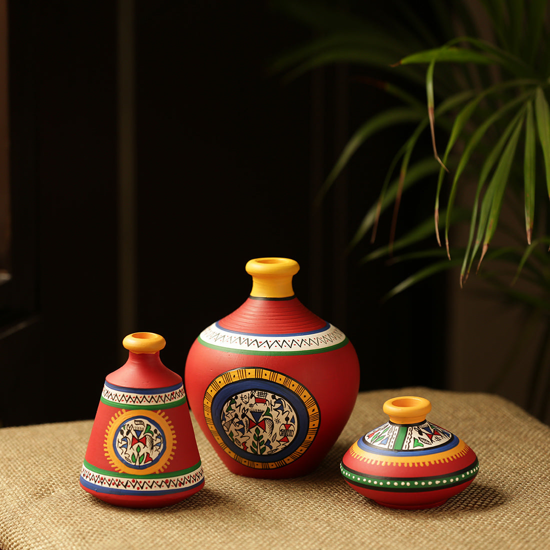 EXCLUSIVELANE 'Warli Red Matkis' Handpainted Terracotta Vases (Set of 3)