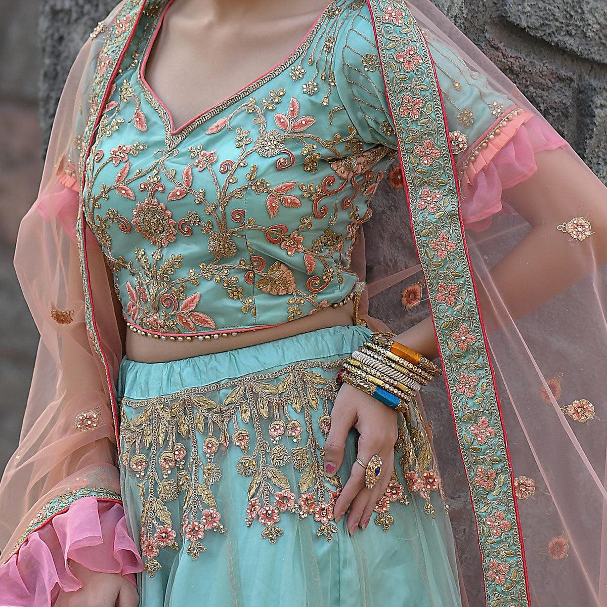 Peachmode Imposing Turquoise Colored Party Wear Embroidered Net Lehenga Choli - view 2