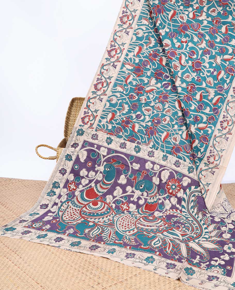 Pothys Blue floral machine-printed kalamkari cotton saree, contrast floral border & peacock pallu