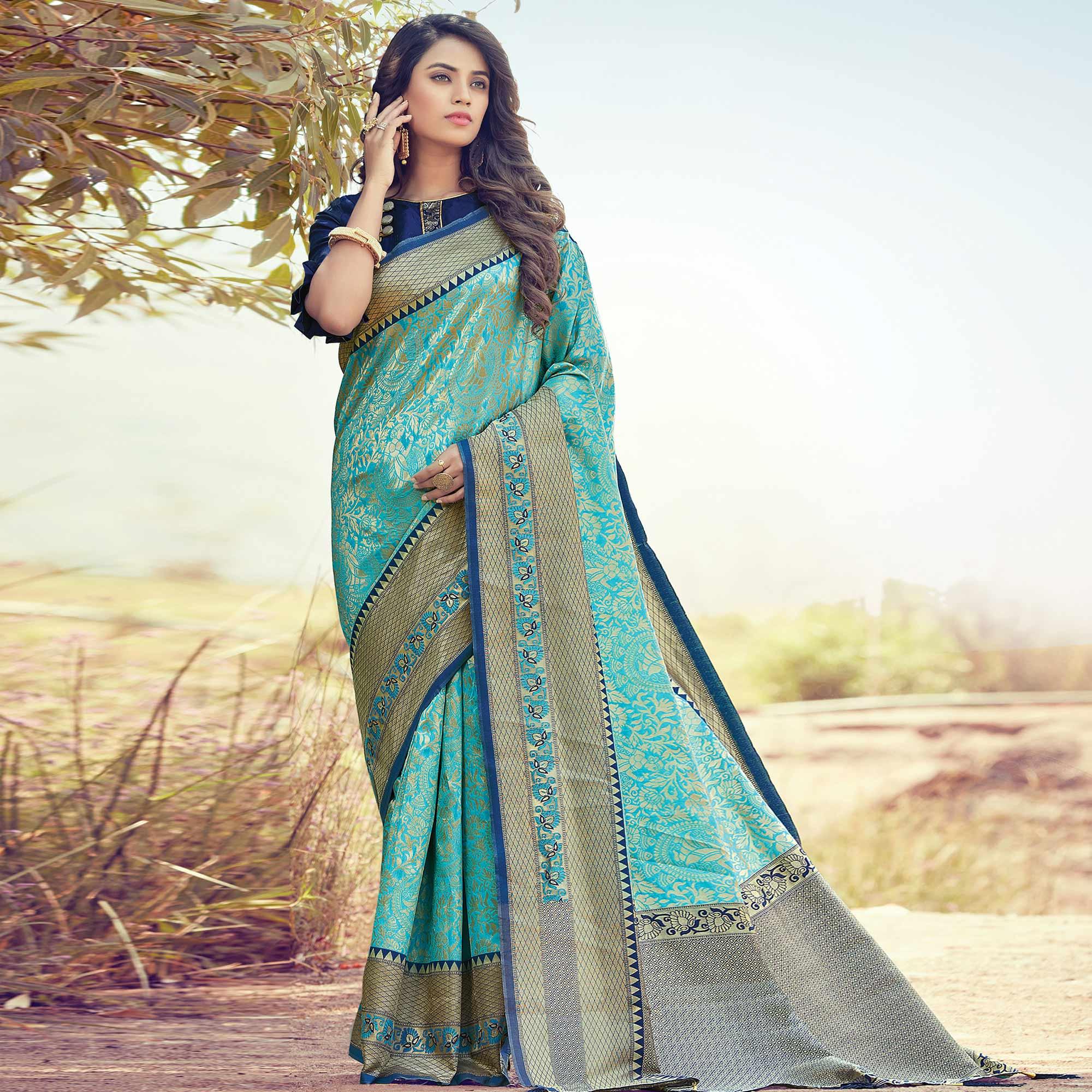 Peachmode Lovely Turquoise Blue Colored Festive Wear Woven Silk Saree