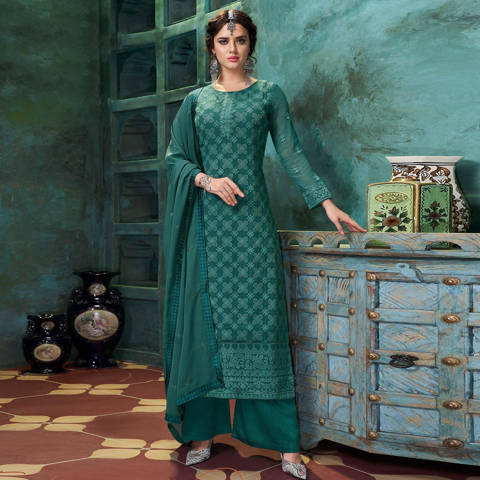 Peachmode Seller Flamboyant Dark Green Colored Partywear Embroidered Heavy Faux Georgette Palazzo Suit