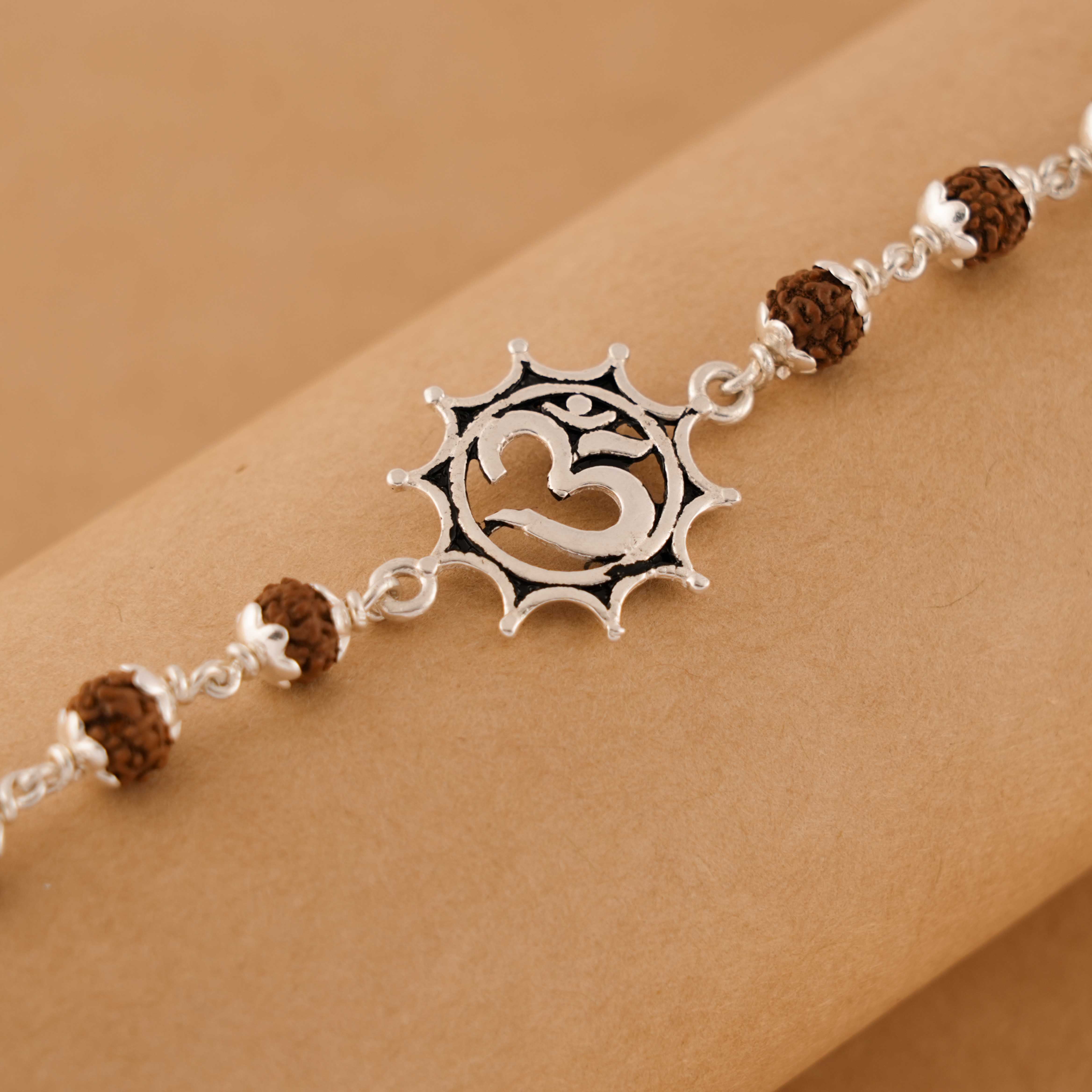 Prinjal Jewellers Silver Rakhi with Om in Pointed Circle and Single Line Rudraksha - view 3
