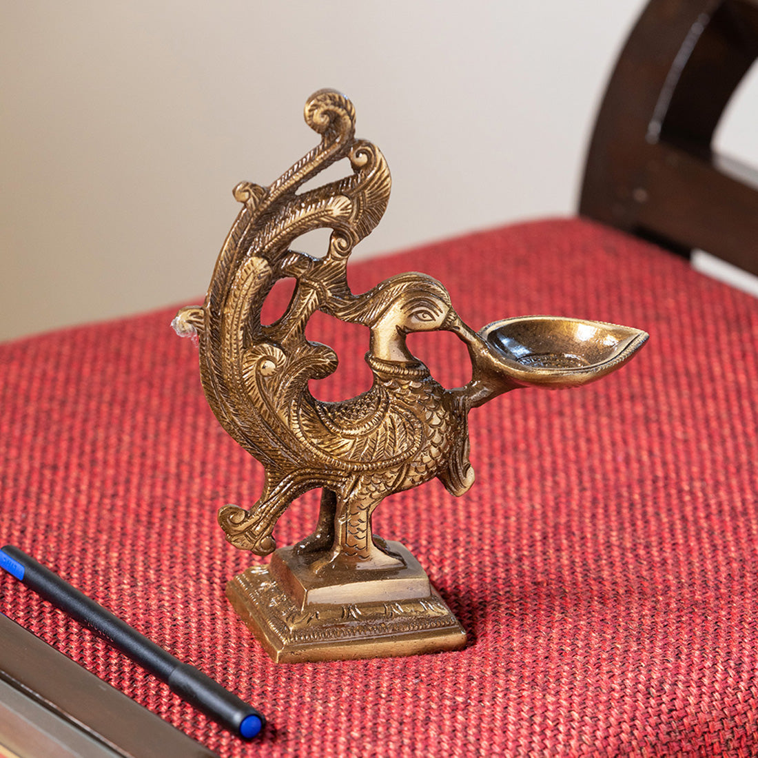 EXCLUSIVELANE 'Princely Peacock' Hand-Etched Carved Diya In Brass