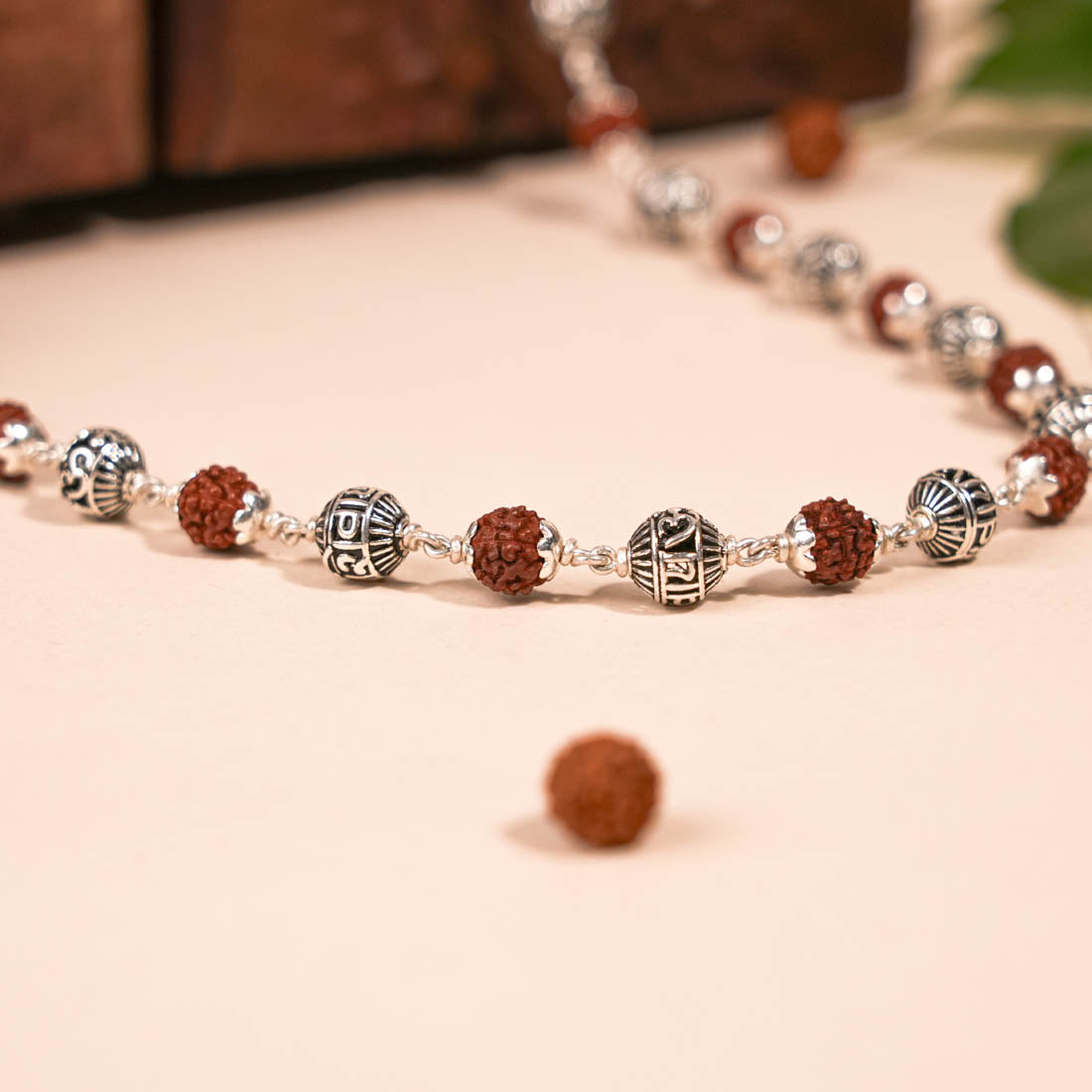 Prinjal Jewellers Rudraksha and Om Namah Shivay silver beads mala
