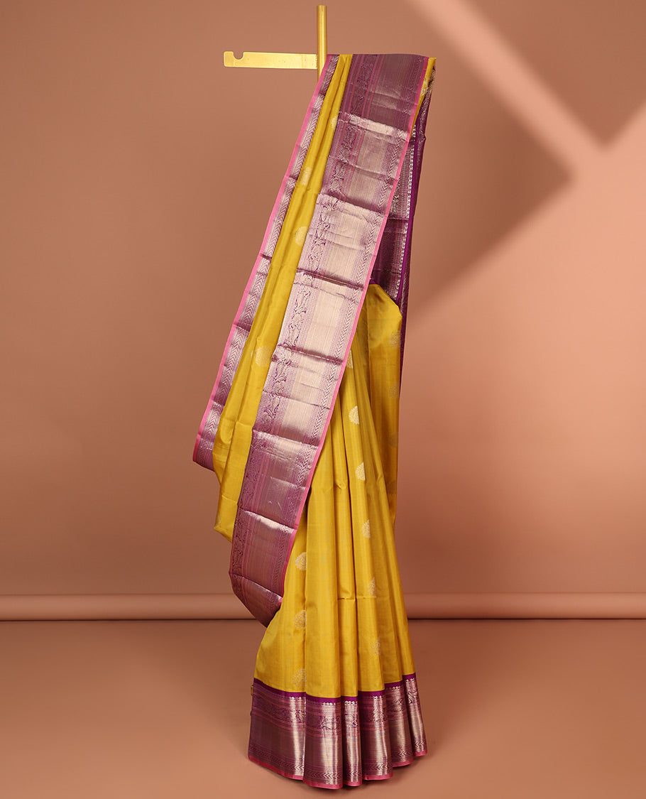 Pothys Green floral buttas silk saree with contrast border of muthu, manga , kuyil kann design & floral zari design pallu