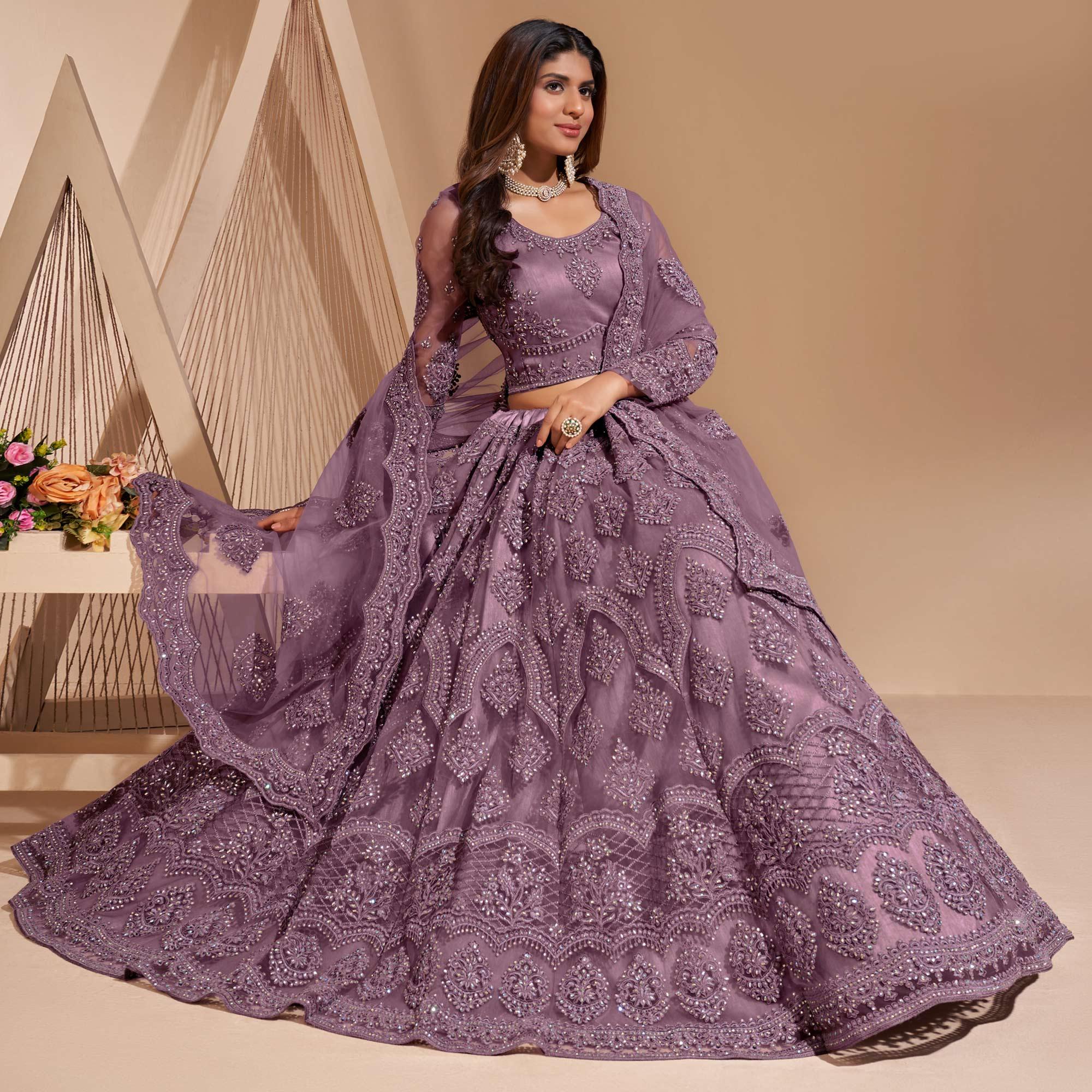 Peachmode Mauve Wedding Wear Embroidered With Embellished Net Lehenga Choli