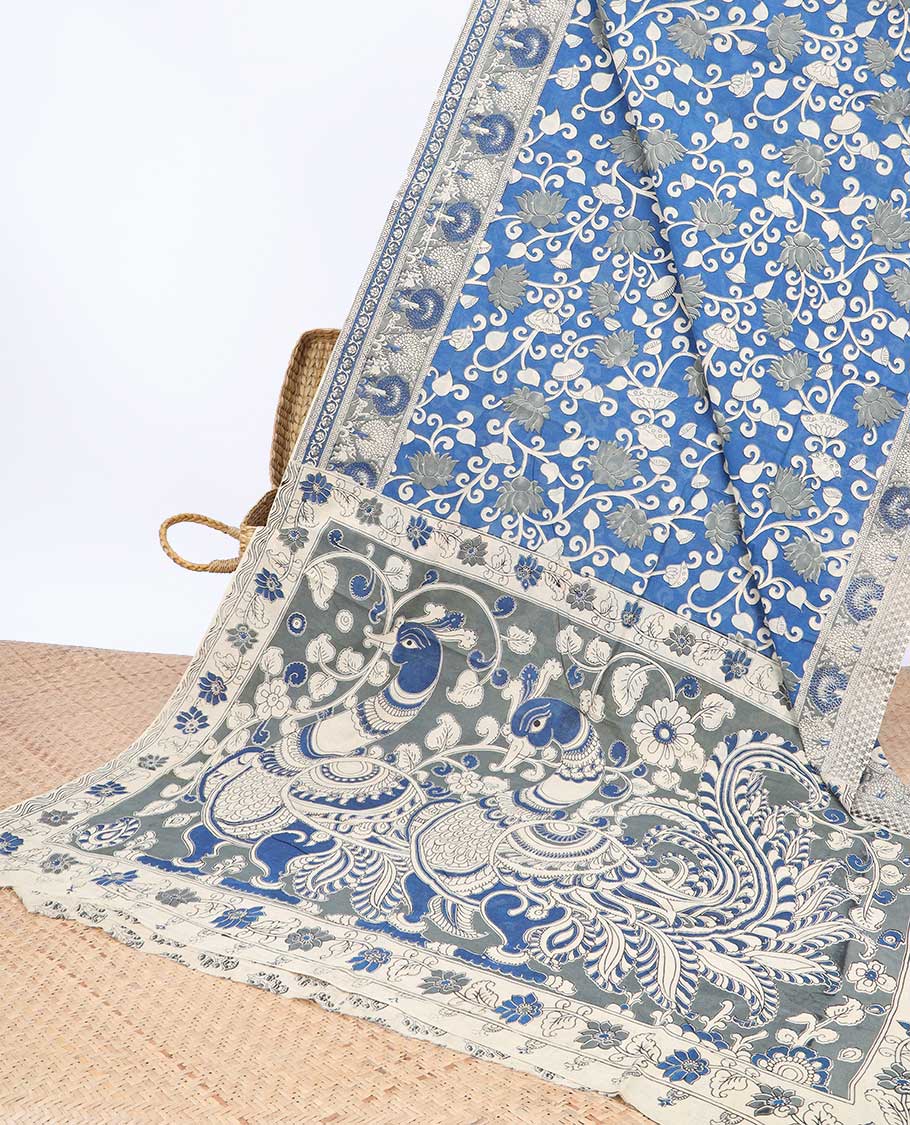 Pothys Blue floral machine-printed kalamkari cotton saree, contrast tree motifs border & peacock pallu