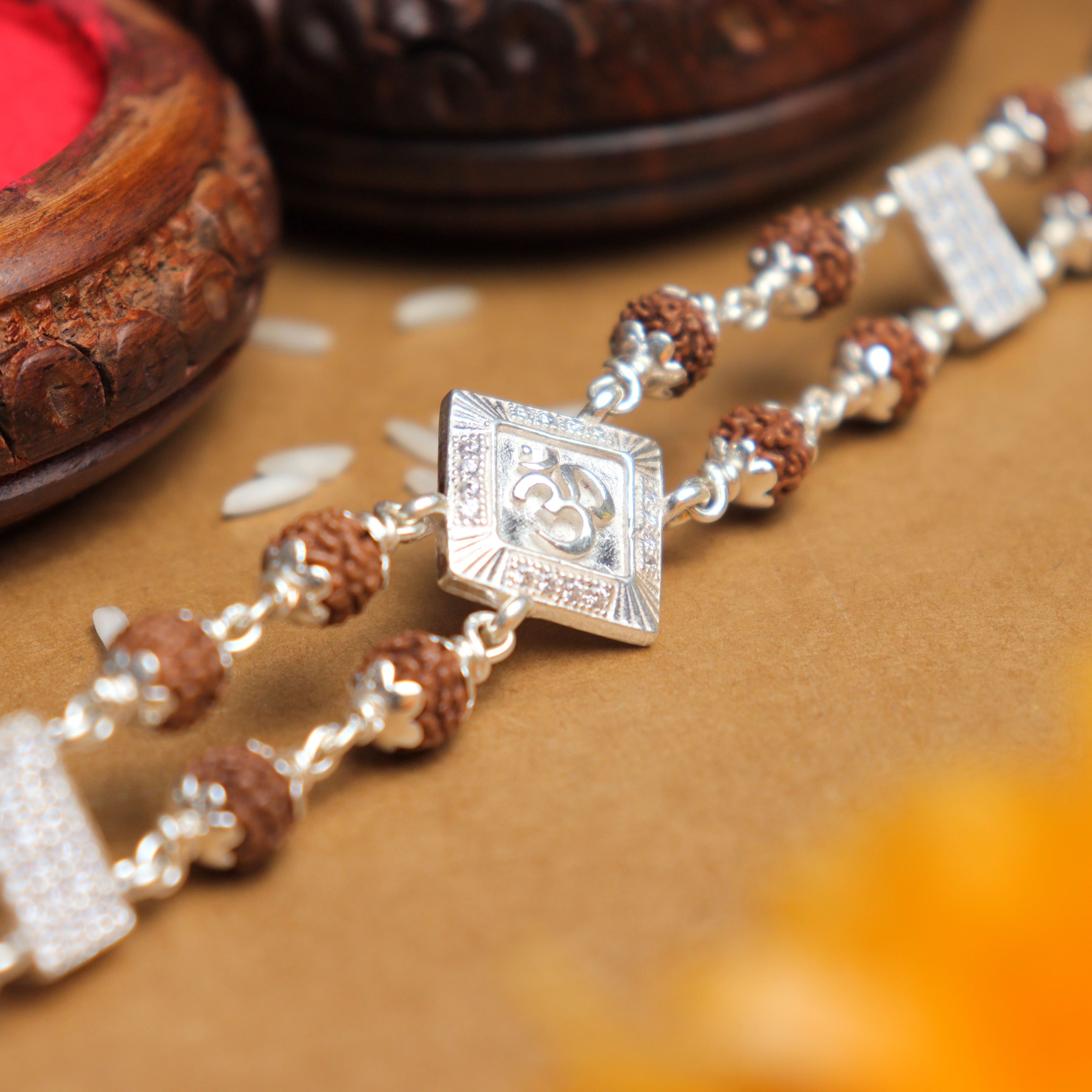 Prinjal Jewellers Silver Rakhi with Rudraksha, Om Brooch, Double Line Bracelet