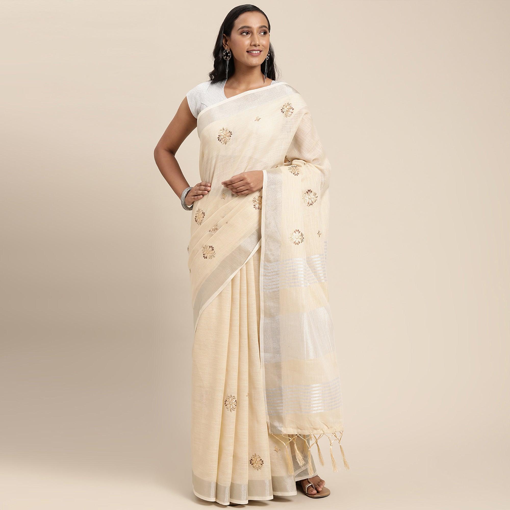Peachmode Cream Embroidered Linen Saree with Tassels
