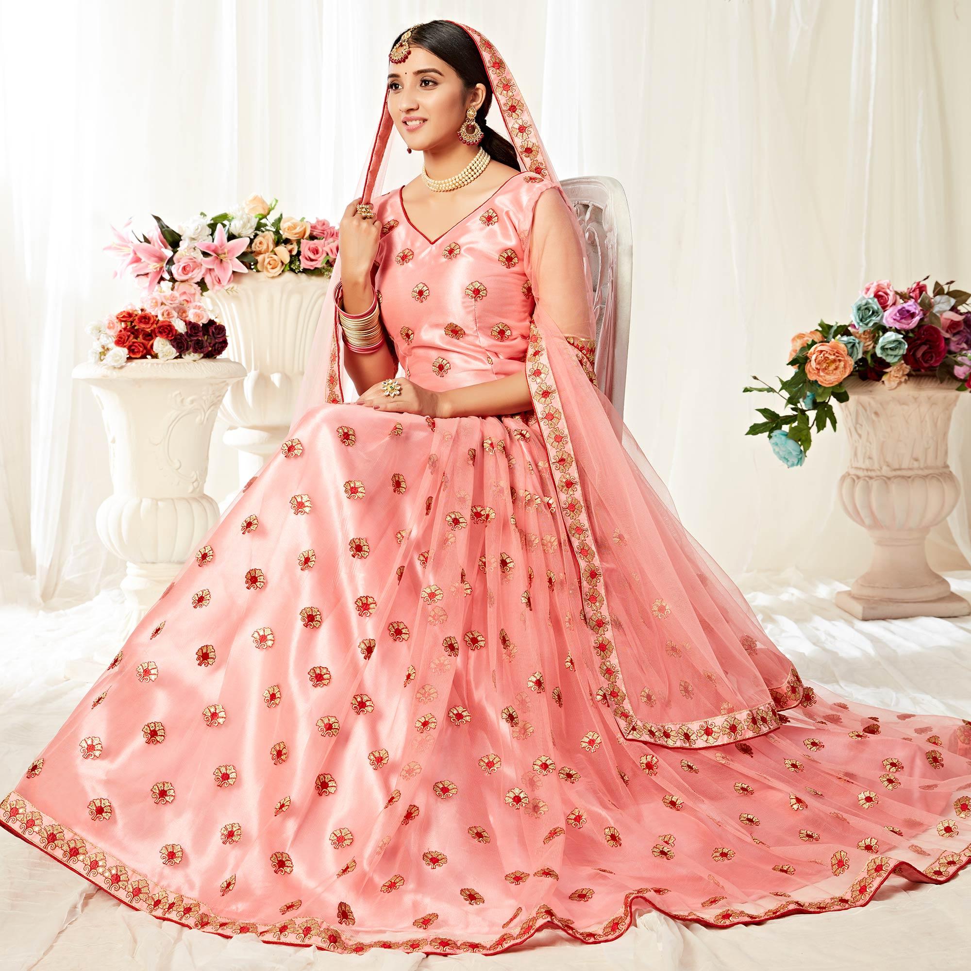 Peachmode Majesty Peach Colored Wedding Wear Embroidered Heavy Net Lehenga Choli - view 3