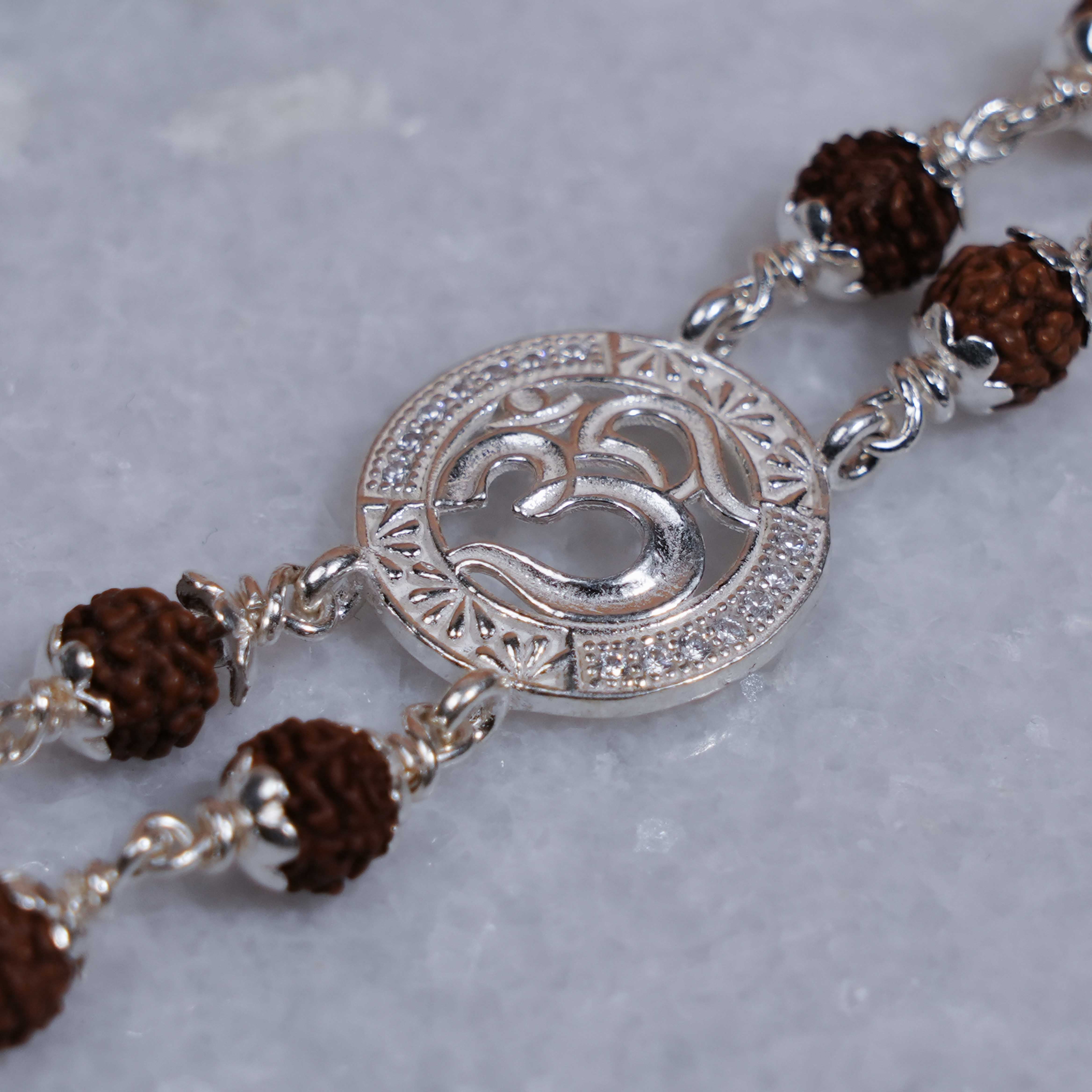 Prinjal Jewellers Original Rudraksha Silver Bracelet with Central Om in Circular Sphere Double Line for Men