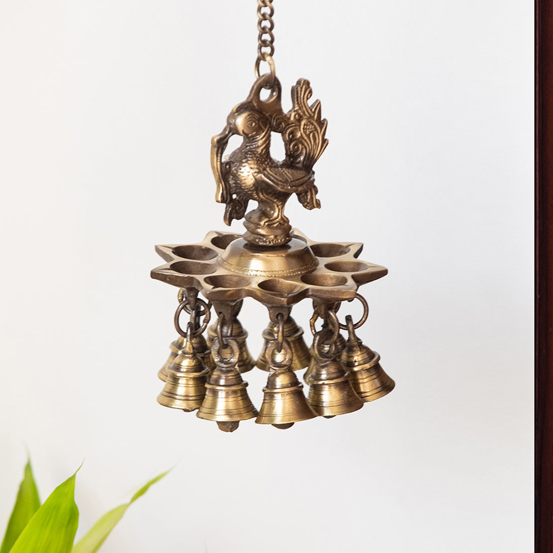 EXCLUSIVELANE 'Paradise Peacock' Hand-Etched Decorative Hanging Diya with Bell In Brass (9 Diyas & Bells)