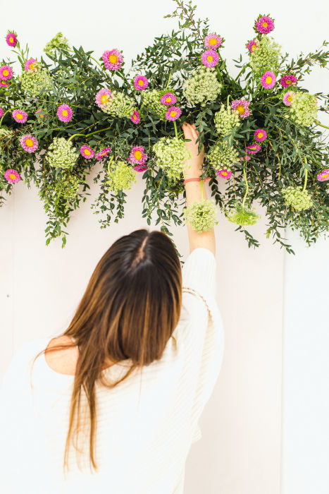 fiftyflowers.com Pops of Pink Floral Backdrop with Wedding Chicks - view 4