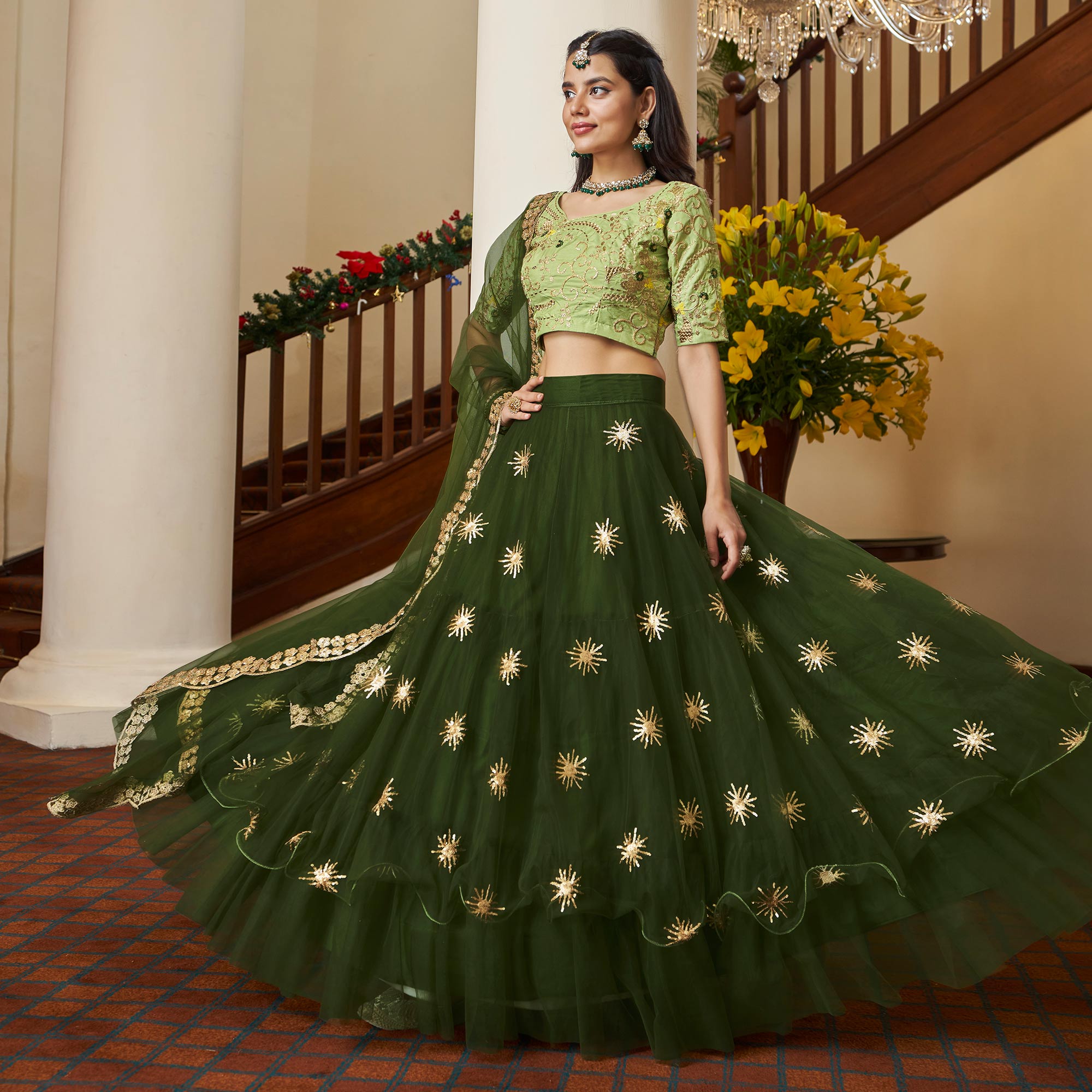Peachmode Mehendi Green Sequins Embroidered Netted Lehenga Choli