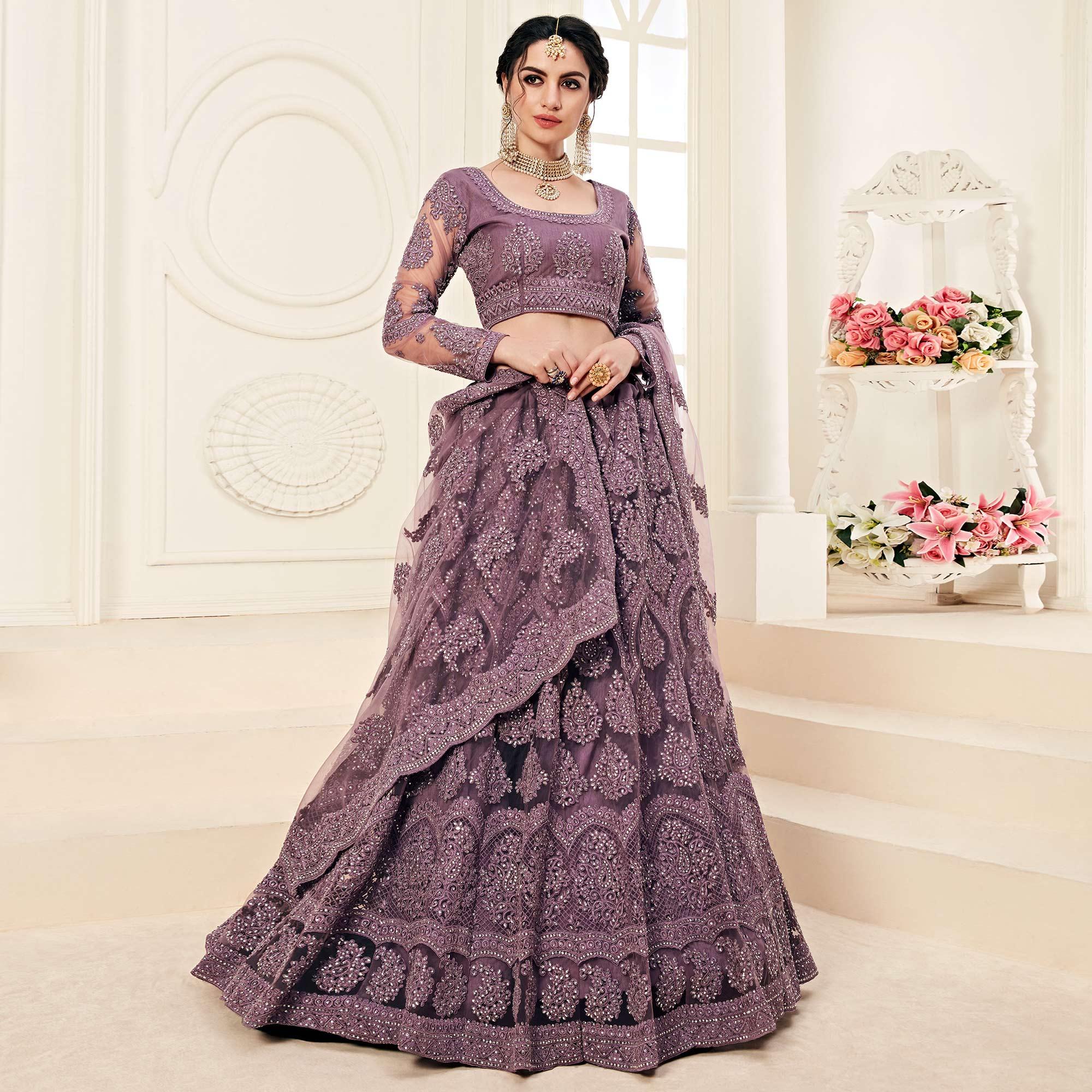 Peachmode Eye-catching Violet Colored Cording Embroidery Wedding Wear Net Lehenga Choli