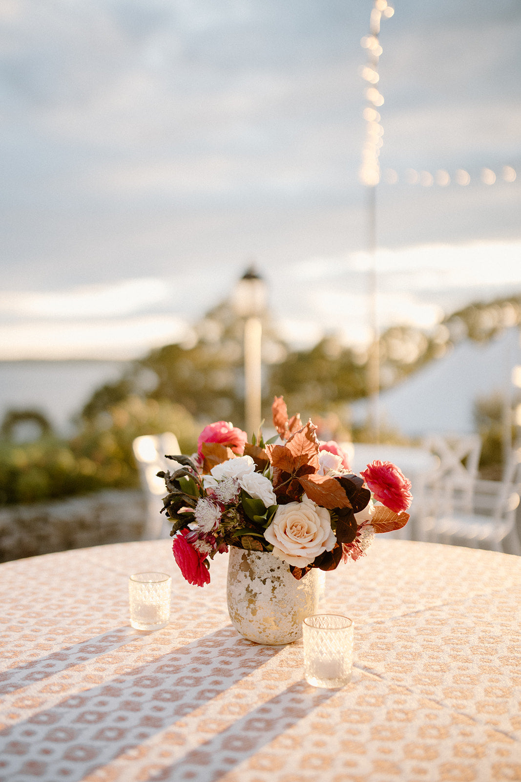 fiftyflowers.com Sophisticated with Vibrant Pop Beach House Wedding - view 2