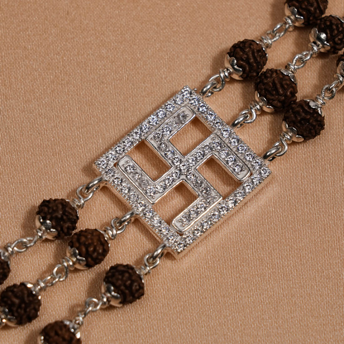 Prinjal Jewellers Rudraksha Silver Swastik Triple Line Bracelet