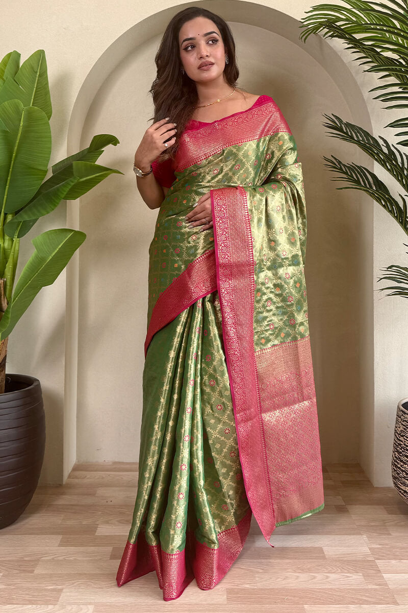 Tasrika Groovy Green Soft Banarasi Tissue Silk Saree With Vivacious Blouse Piece