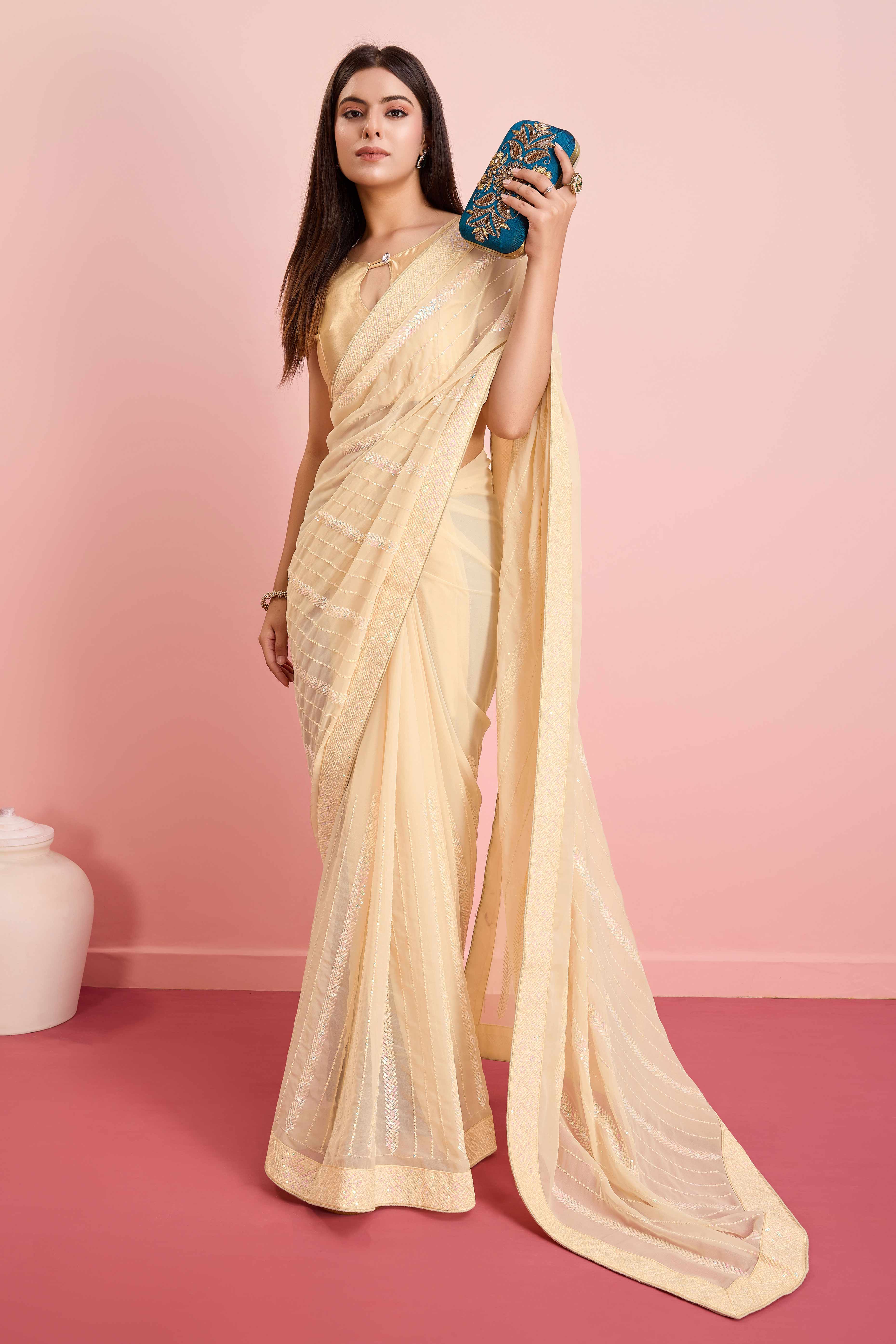 Peachmode Cream Sequins Embroidered Georgette Saree