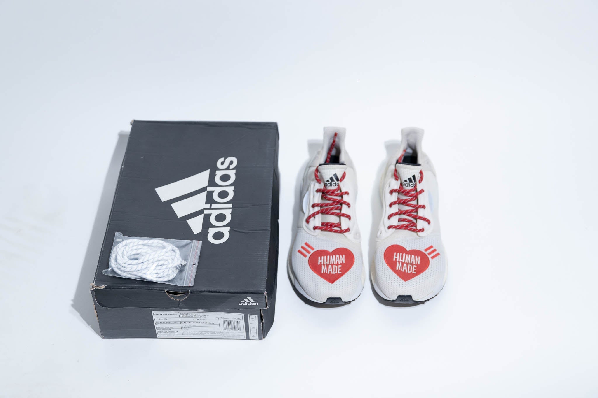 Glide love sneakers – Adidas x Human Made Solar Hu Glide “Love” Sneakers