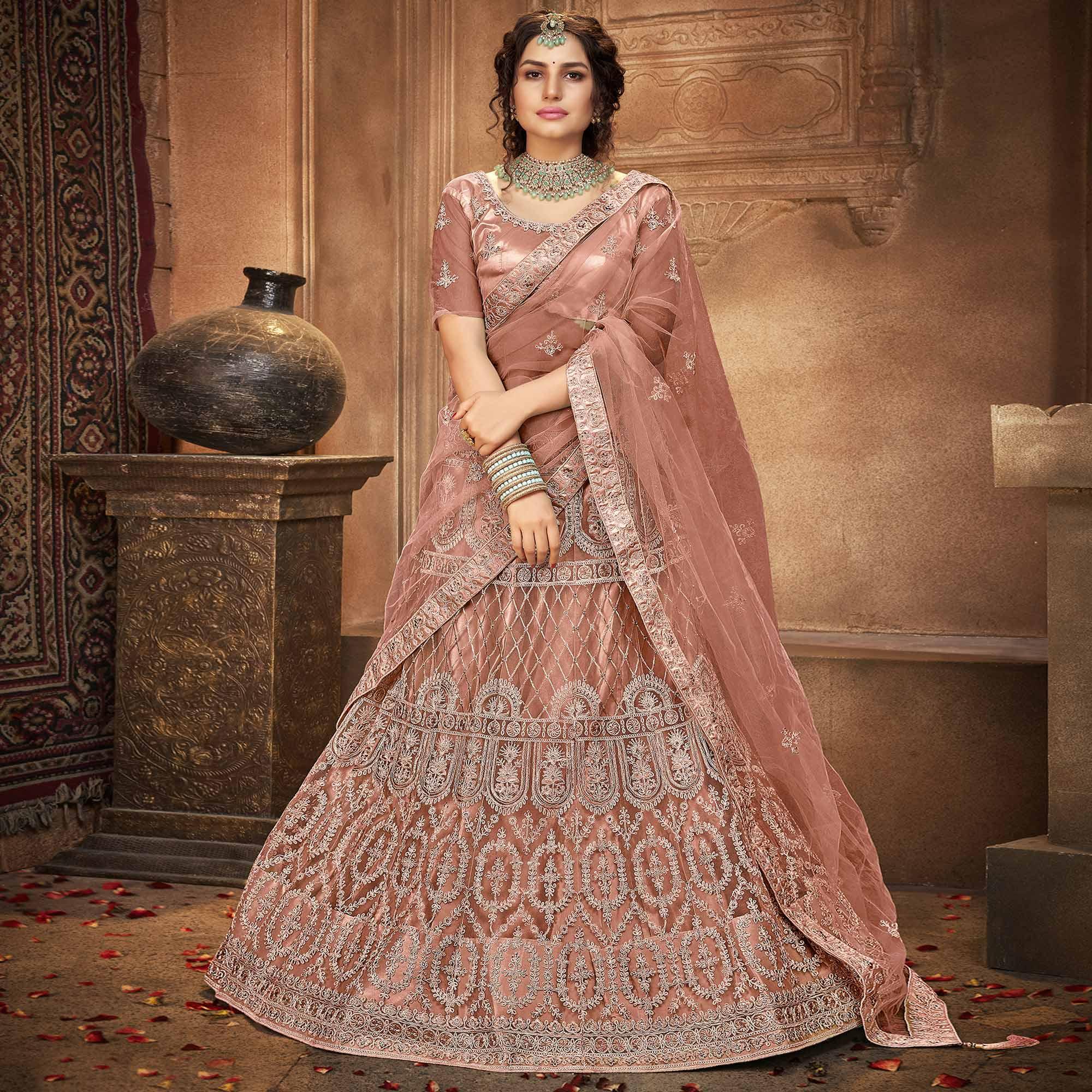 Peachmode Dusty Pink Partywear Multi Sequins Embroidered Net Lehenga Choli