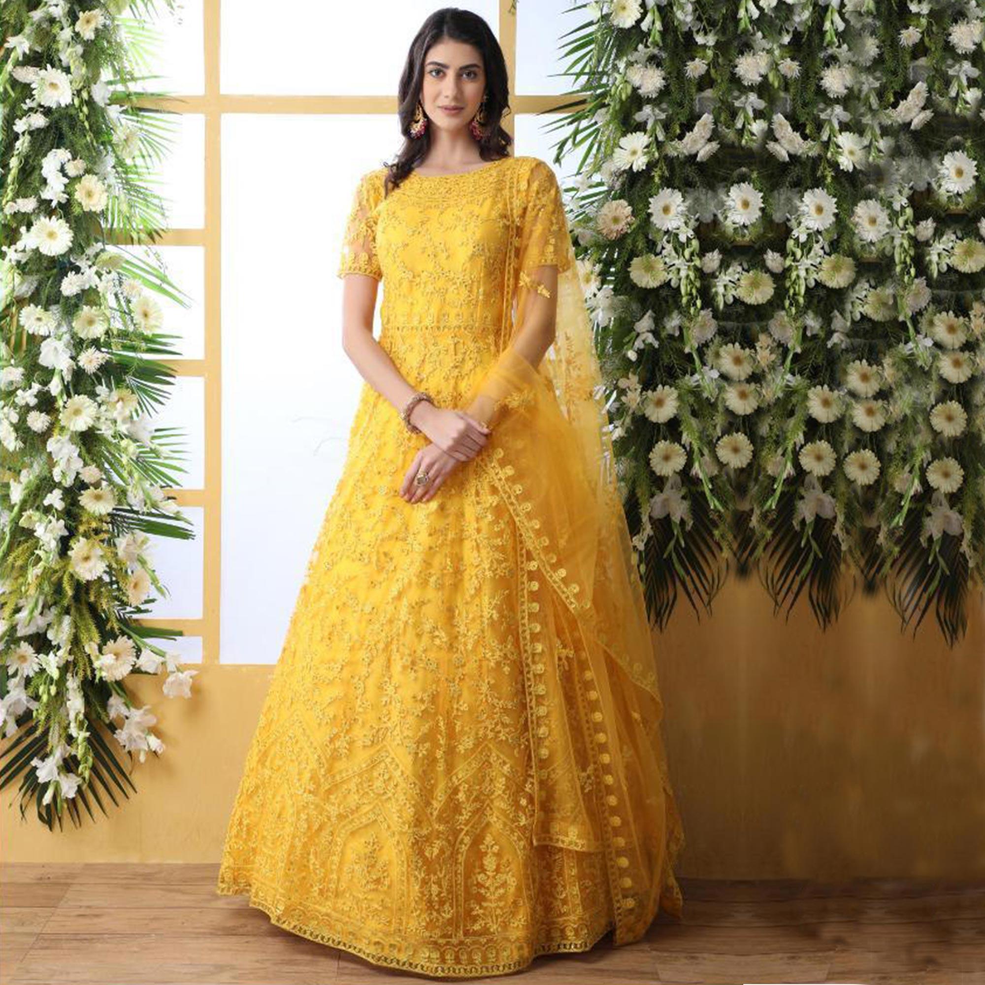 Peachmode Demanding Yellow Colored Party Wear Embroidered Net Gown With Dupatta