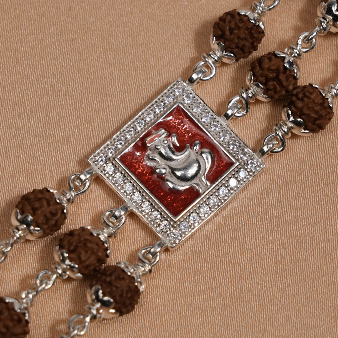 Prinjal Jewellers Rudraksha Silver Ganesh in Red Triple Line Bracelet