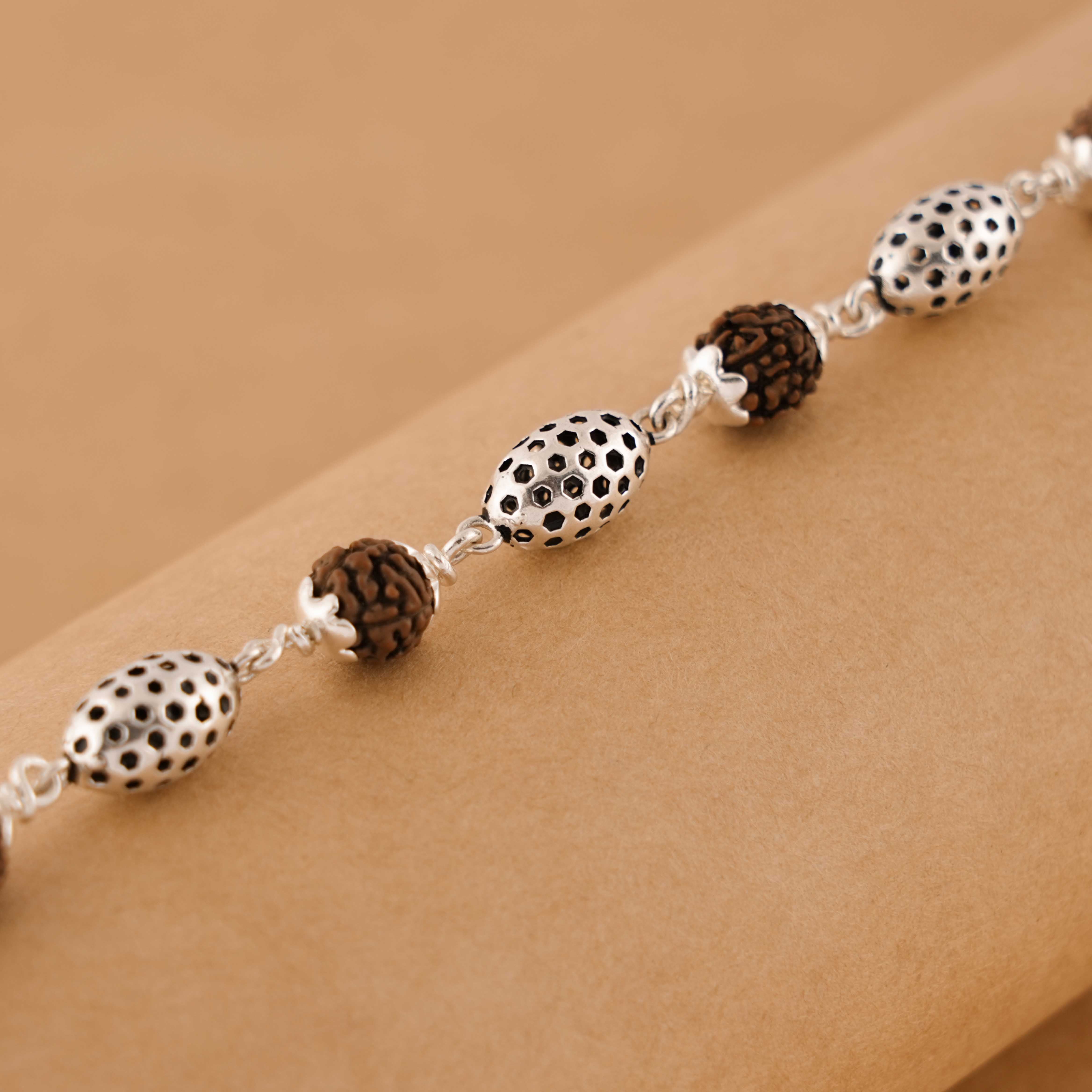 Prinjal Jewellers Rudraksha Silver Hollow Oval Beads Bracelet.