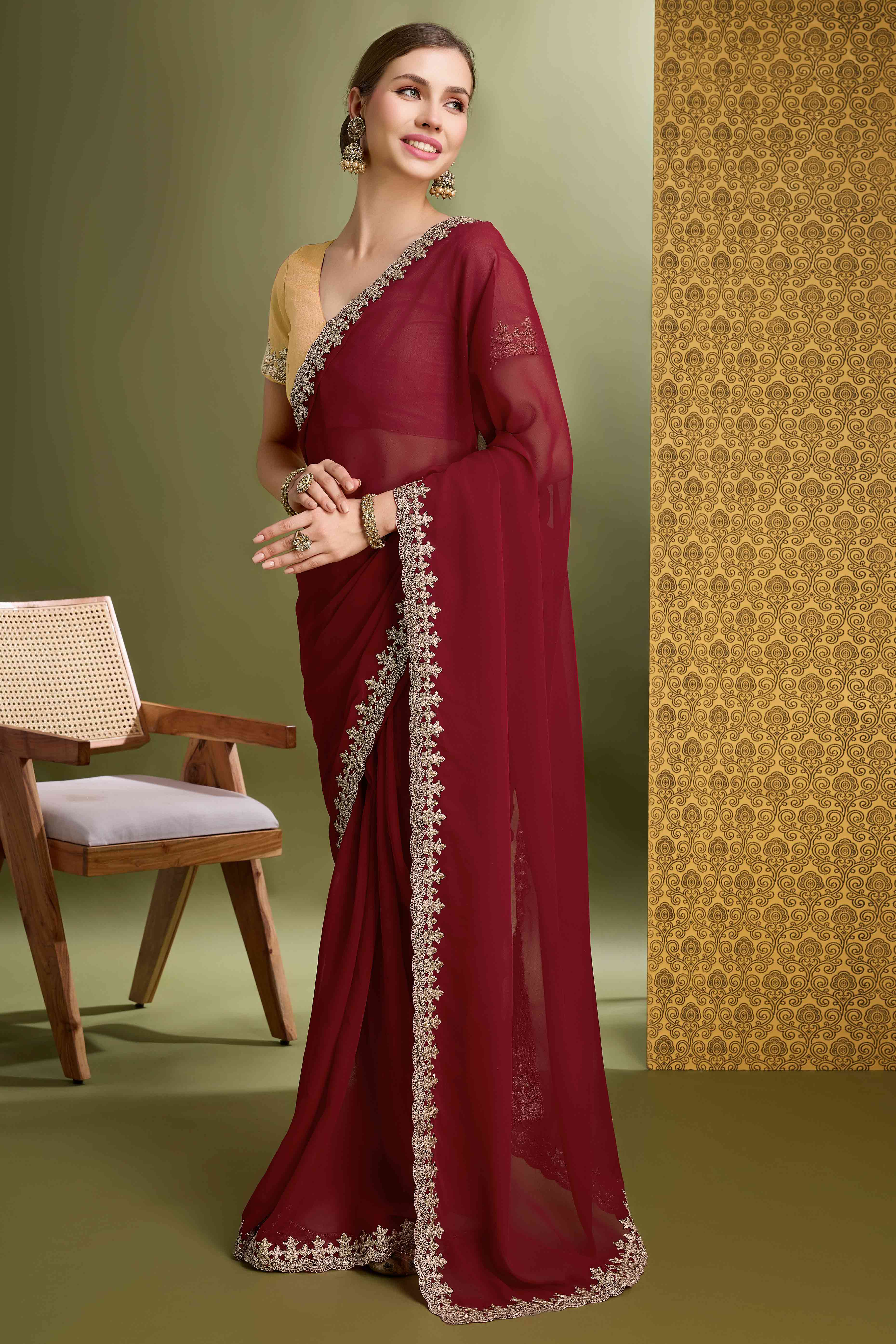 Peachmode Maroon Solid With Zari Embroidered Georgette Saree
