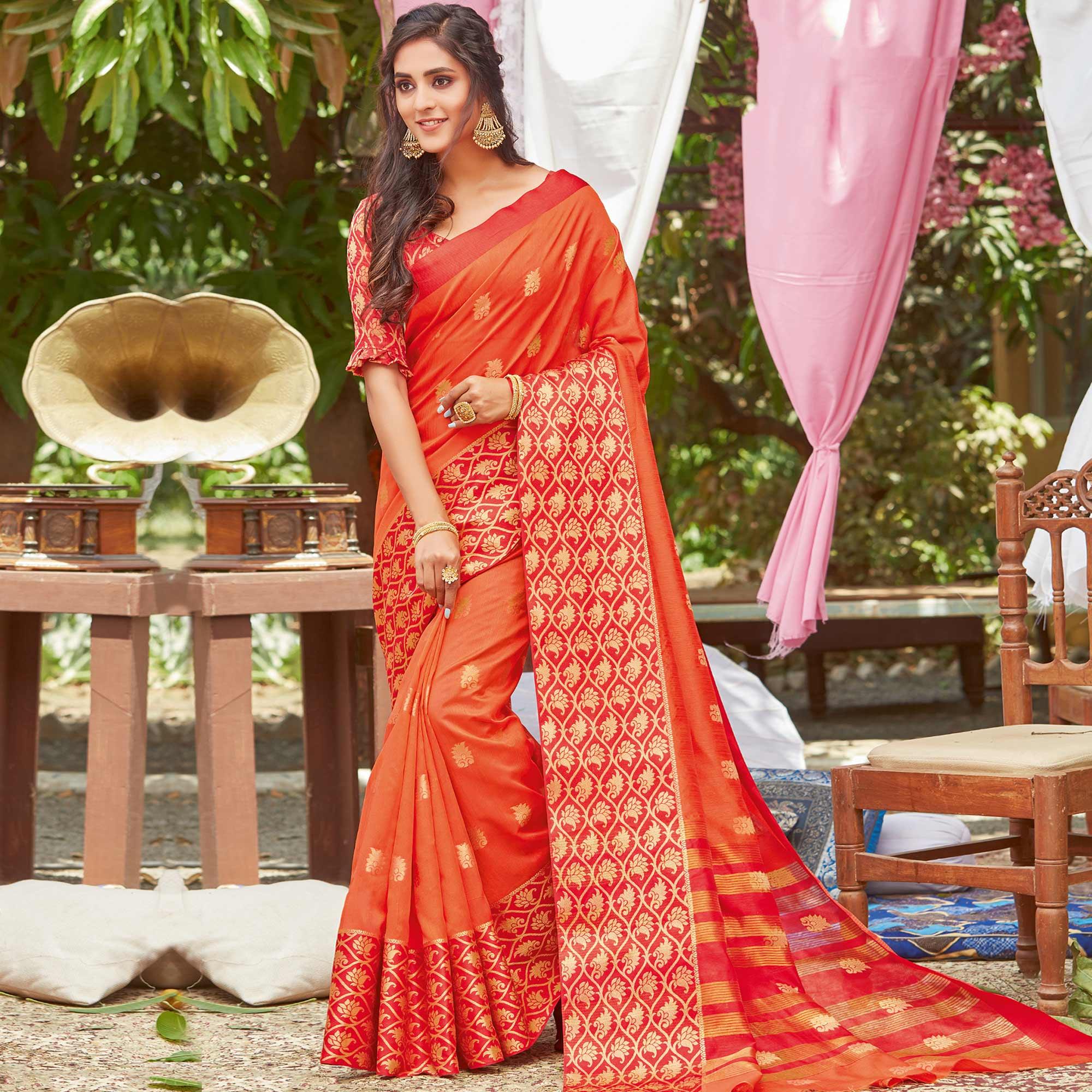 Peachmode Magnetic Orange Coloured Casual Wear Embroidered Crystal Silk Saree