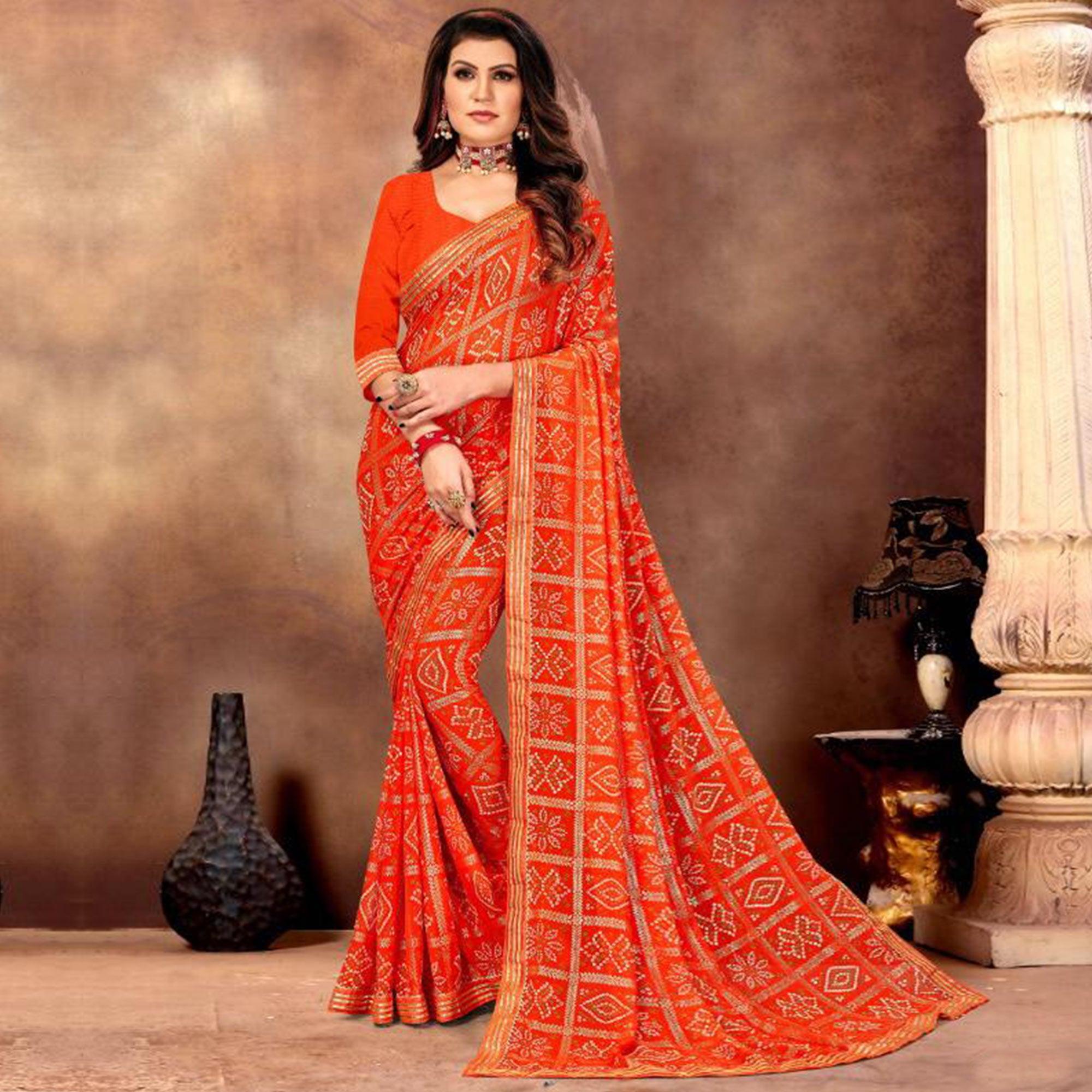 Orange sarees – BlackTree graceful-orange-colored-festive-wear-bandhani-print-with-gotta-border-heavy-georgette-saree-100352