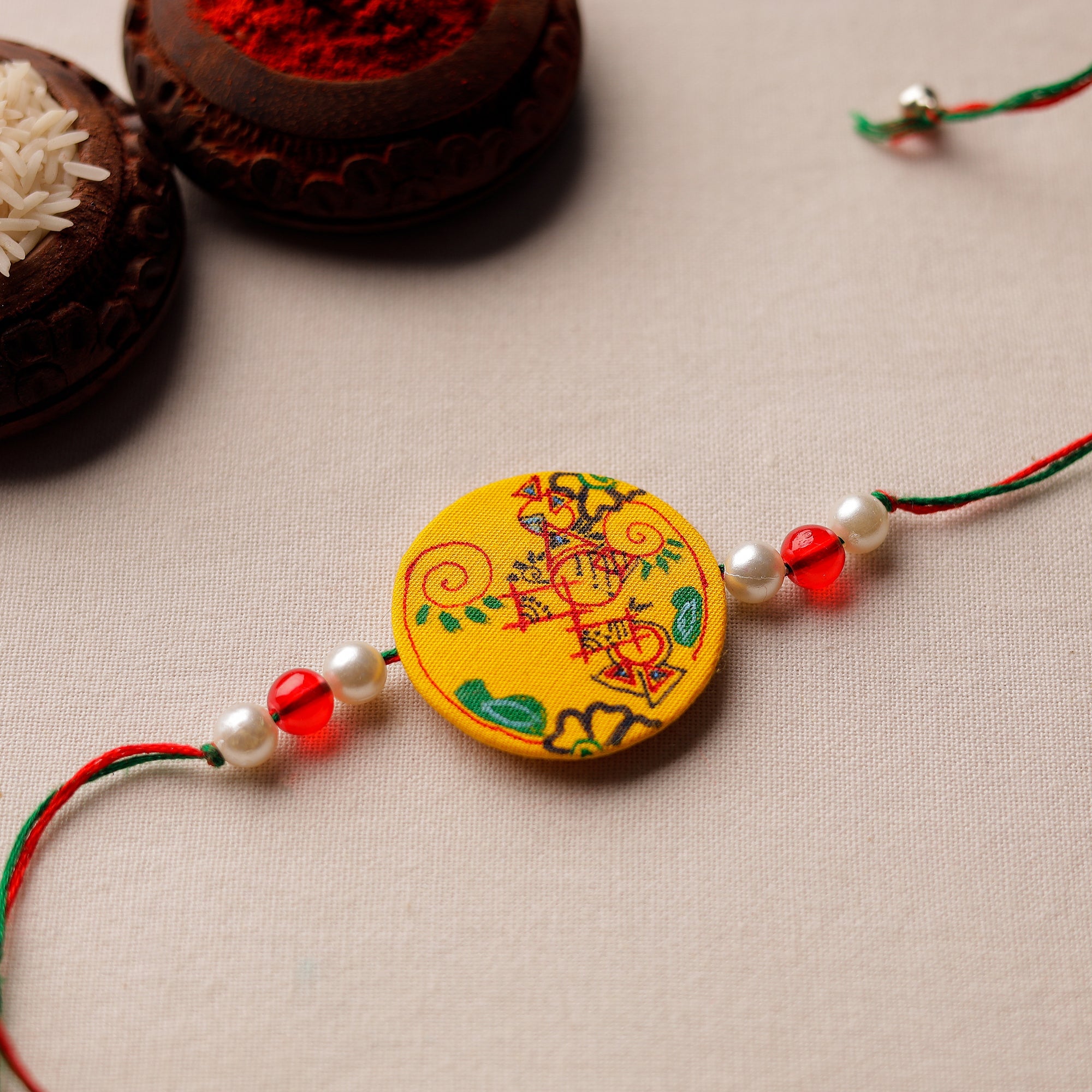 KHUSHBASH - HAPPY LOOM OF EAST Bishnupur Handpainted Fabric Rakhi 06