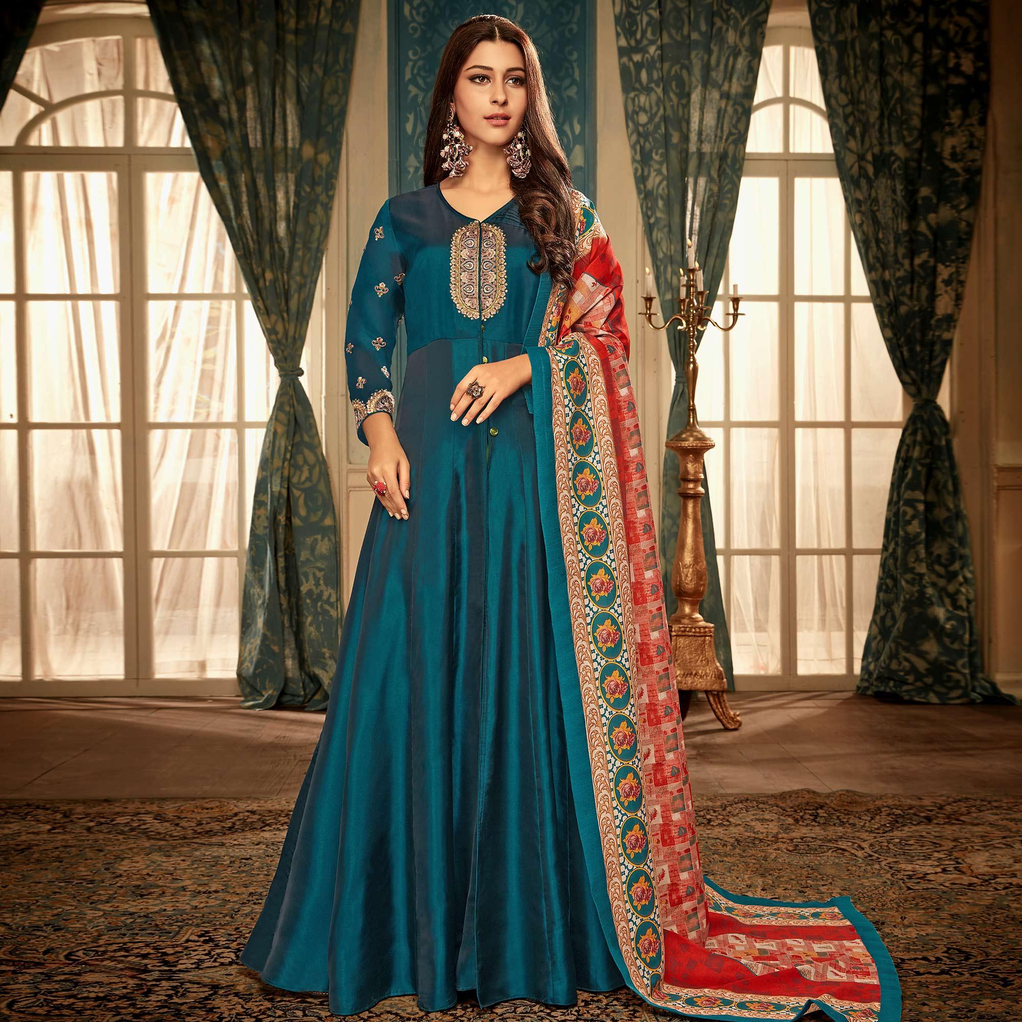Peachmode Seller Impressive Teal Blue Colored Partywear Embroidered Heavy Muslin Gown