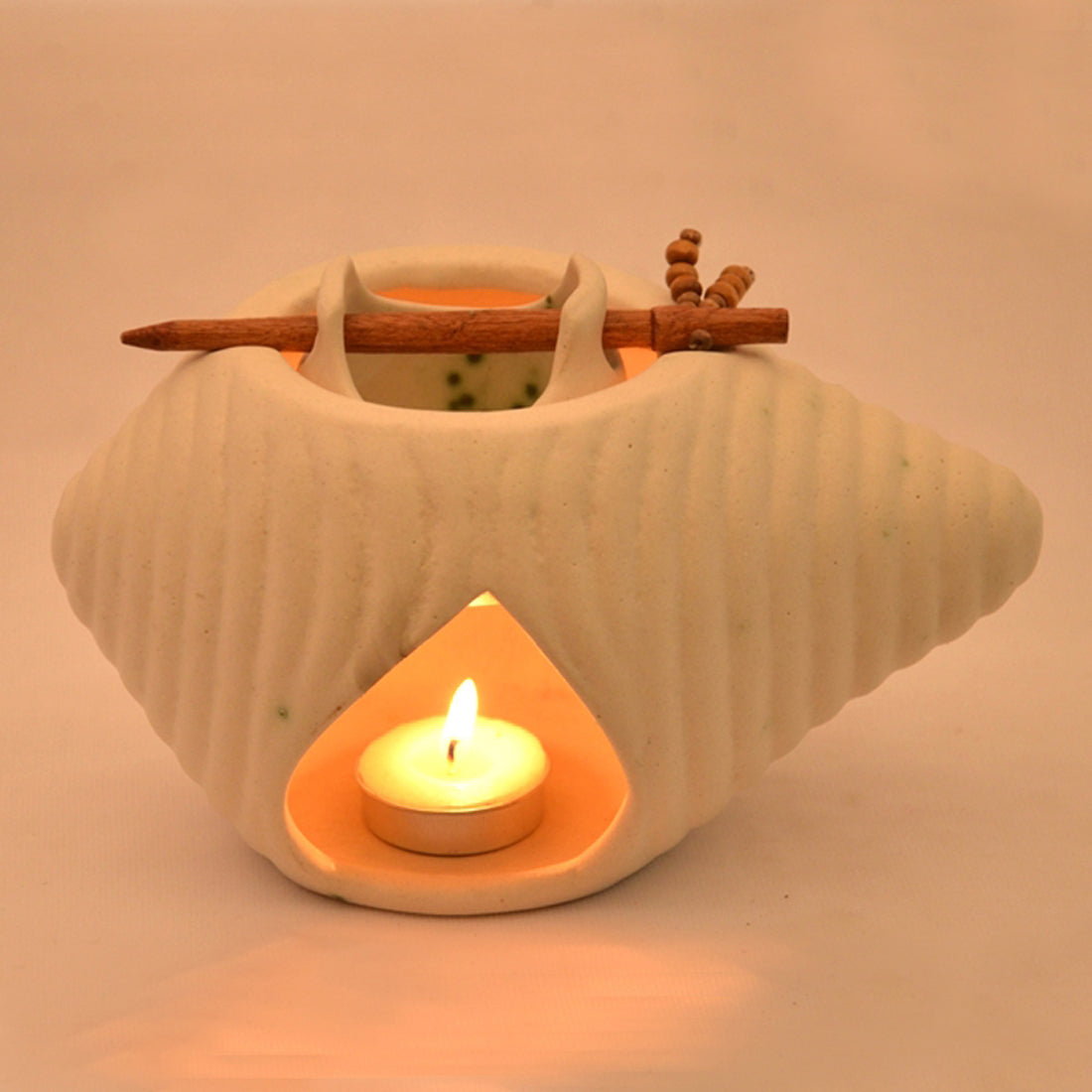 EXCLUSIVELANE 'Shankh Shaped' Ceramic Oil Burner In White