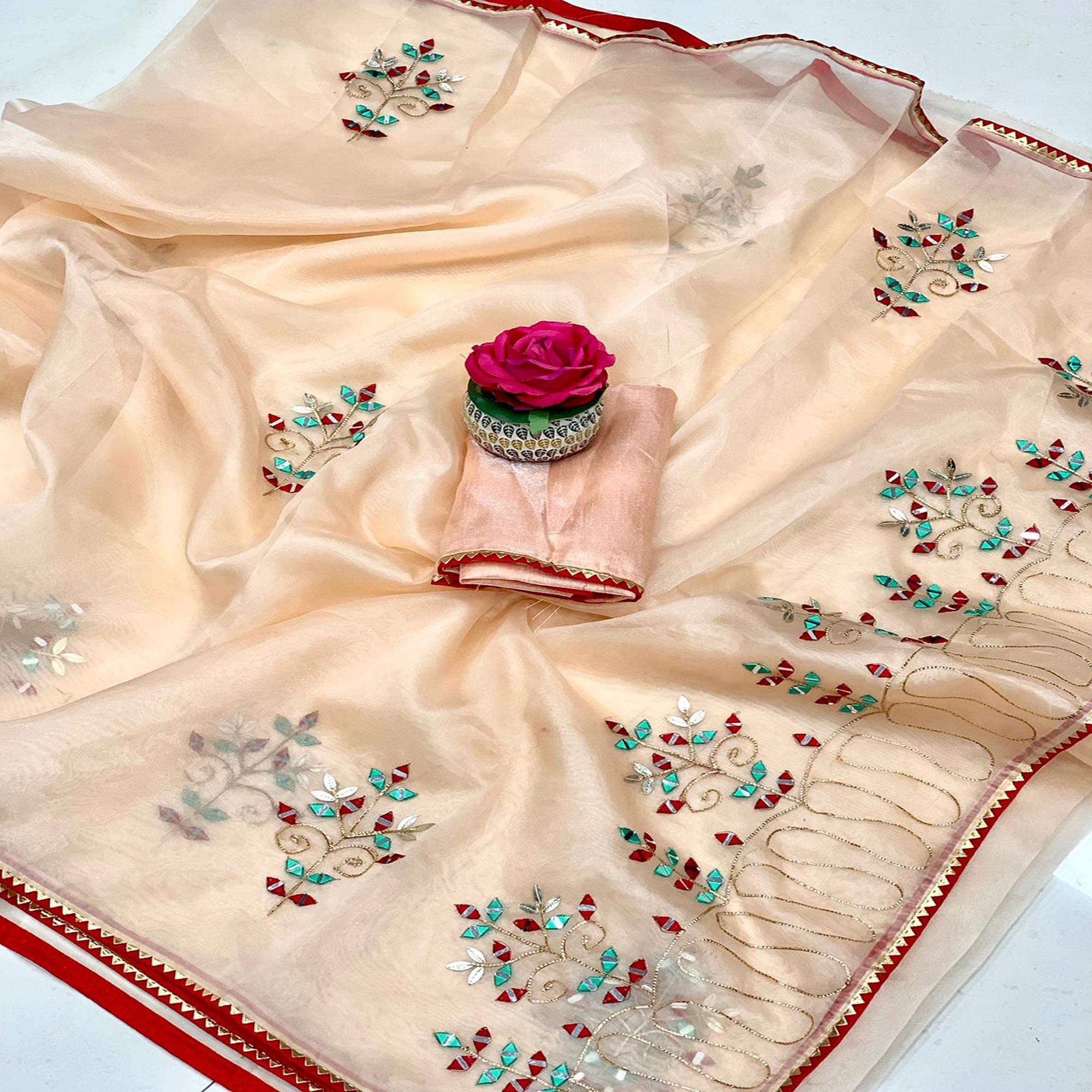 Peachmode Cream Embellished With Embroidered Organza Saree