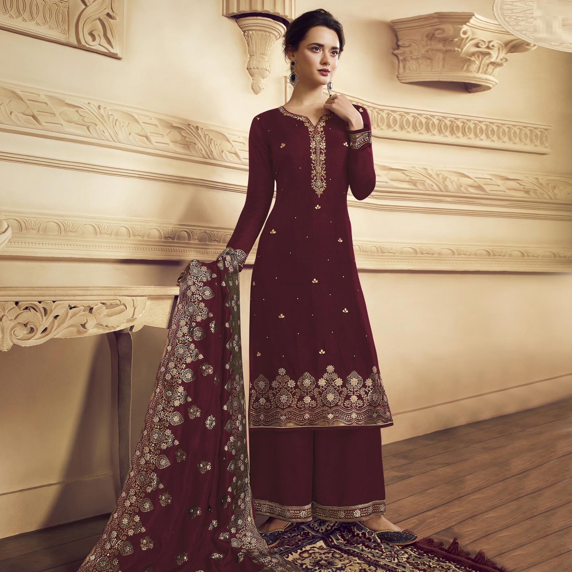Peachmode Ethnic Maroon Colored Partywear Embroidered Crepe Straight Suit