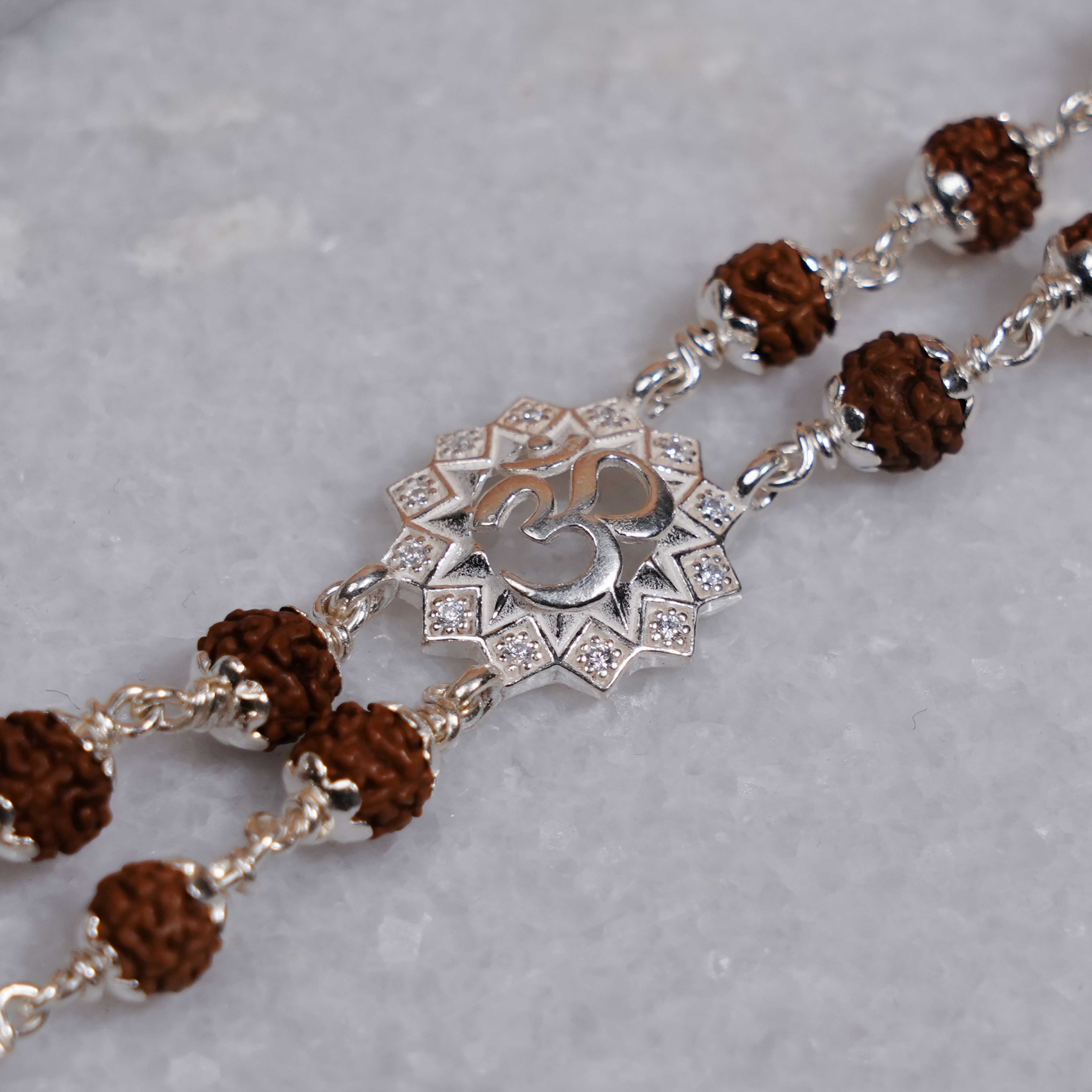 Prinjal Jewellers Rudraksha Silver Om Flower double line Bracelet