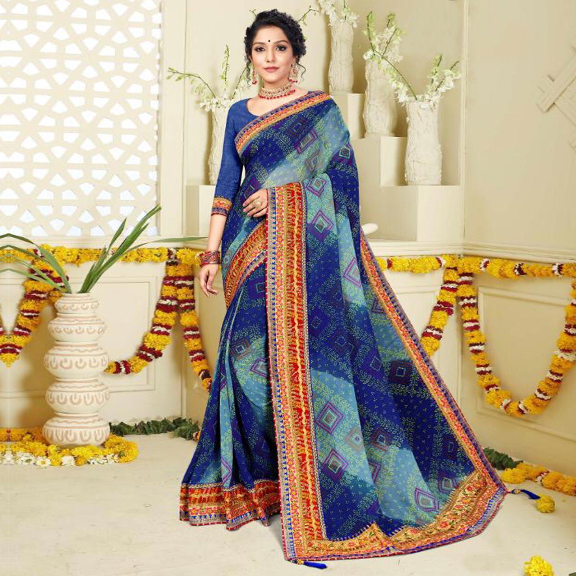 Peachmode Engrossing Blue Colored Festive Wear Bandhani Print With Zari Border Work And Latkan Heavy Georgette Saree