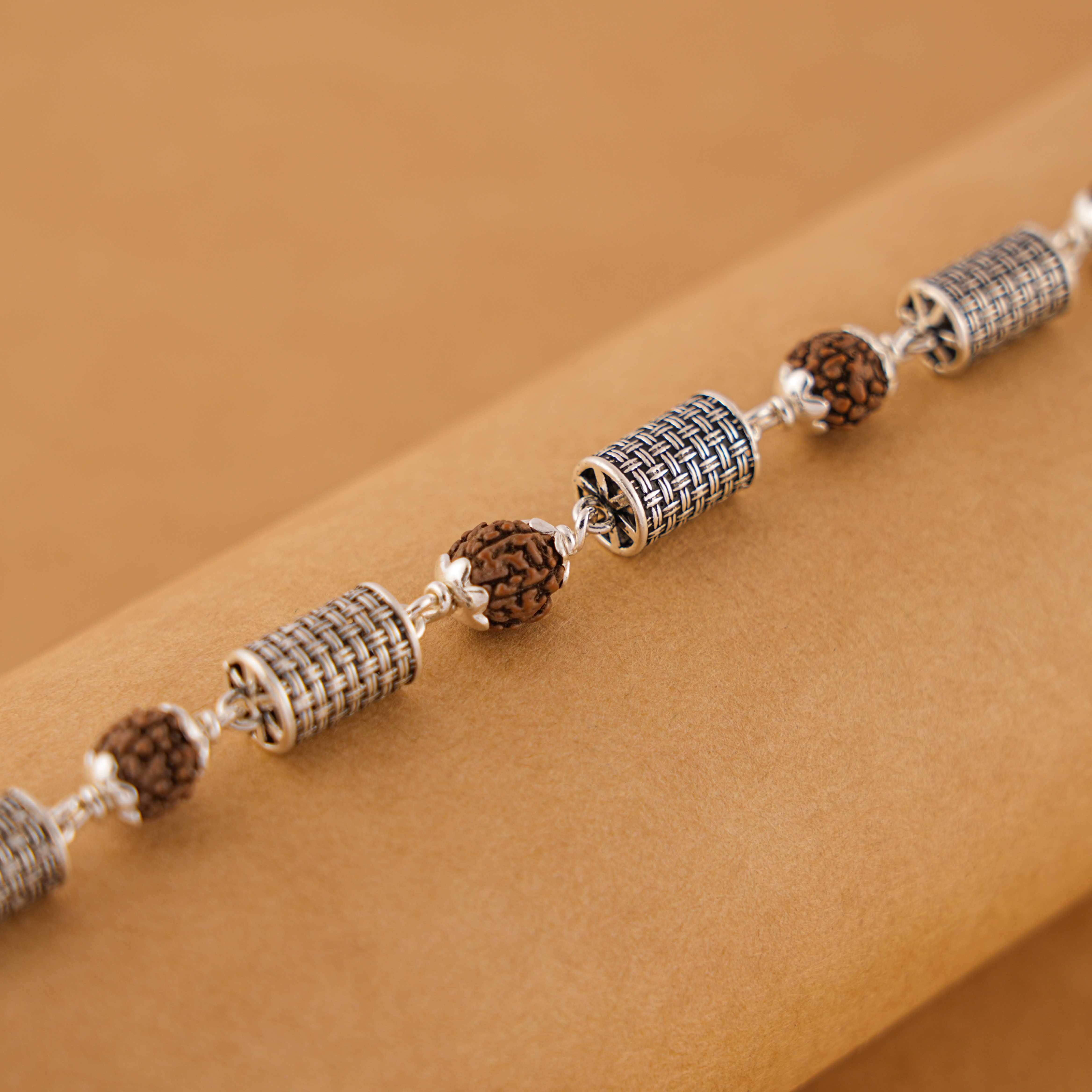 Prinjal Jewellers Rudraksha and Hollow Cylindrical Silver Beads Bracelet
