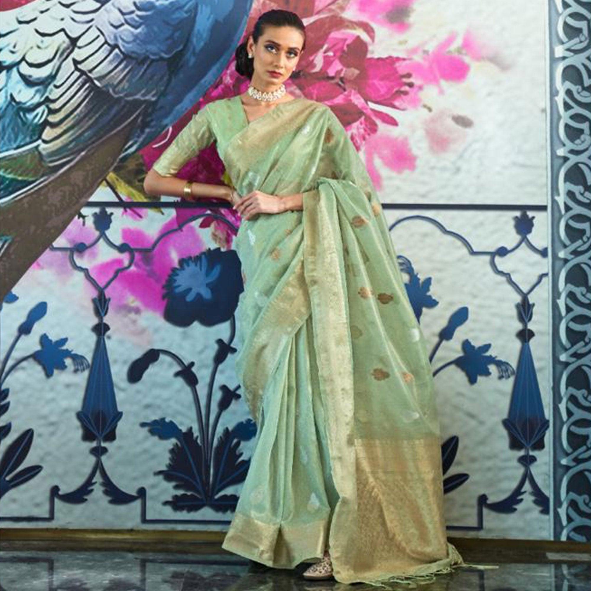Peachmode Dazzling Turquoise Coloured Partywear Organza weaving Saree