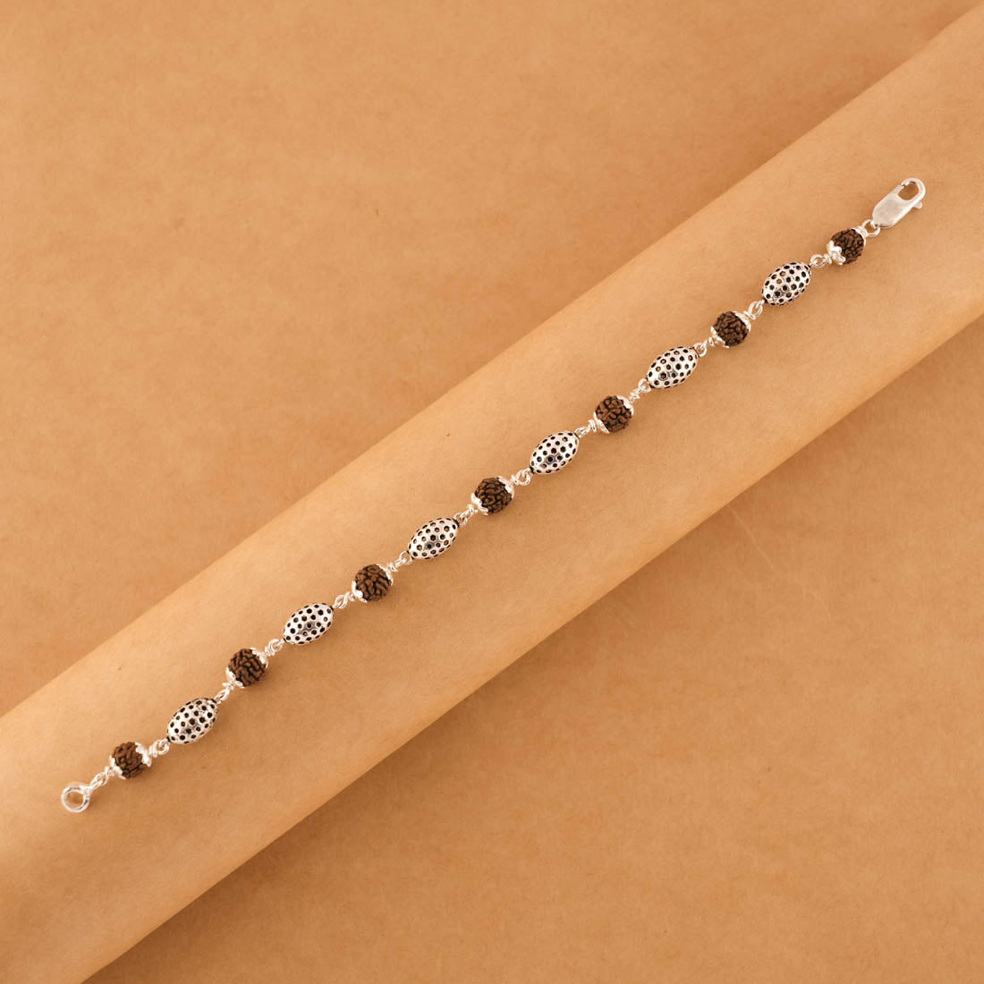 Prinjal Jewellers Rudraksha Silver Hollow Oval Beads Bracelet. - view 2