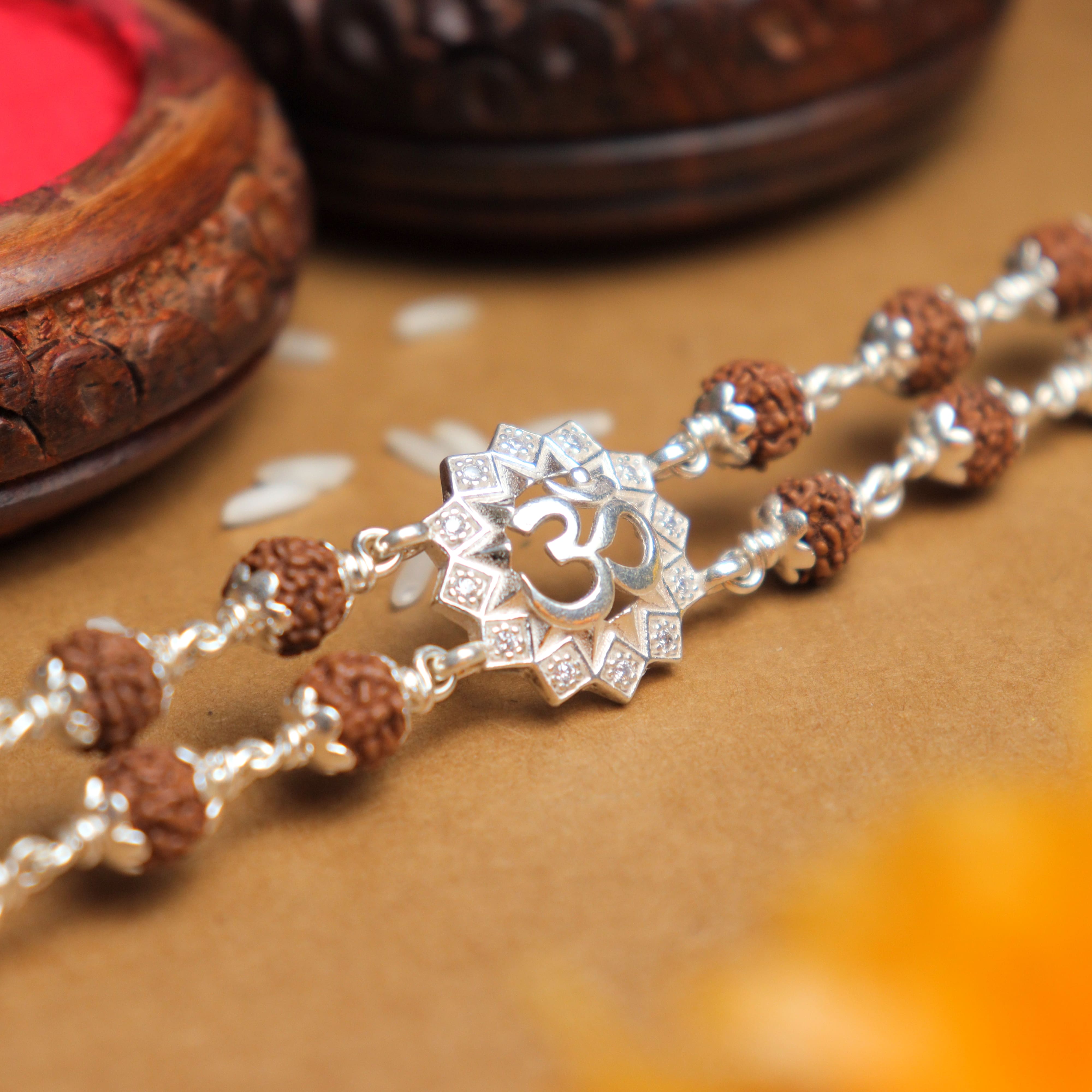 Prinjal Jewellers Silver Rakhi with Rudraksha, Om Flower Design, Double Line Bracelet