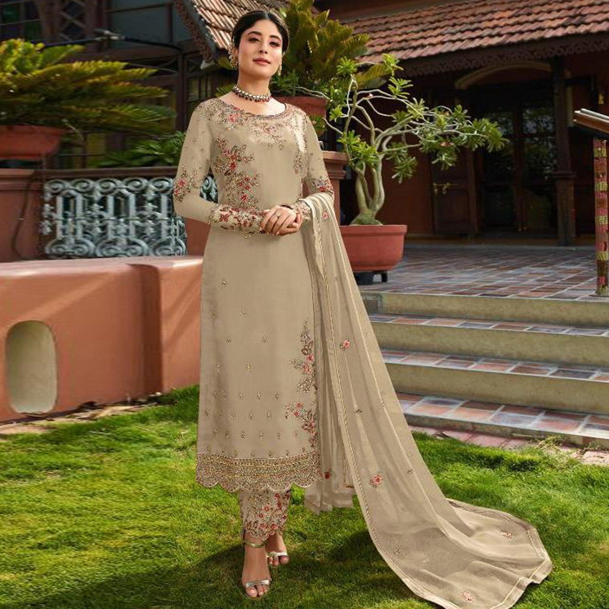 Peachmode Demanding Beige Colored Partywear Embroidered Gerorgette Straight Suit