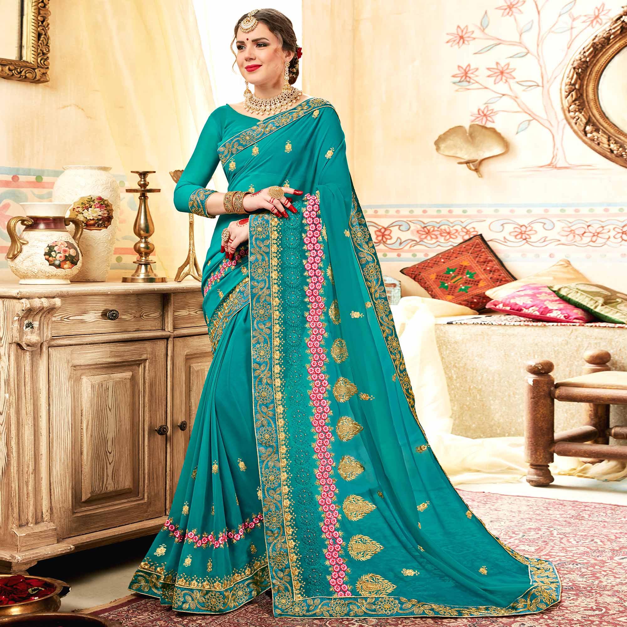 Peachmode Exceptional Aqua Blue Colored Partywear Embroidered Georgette Saree