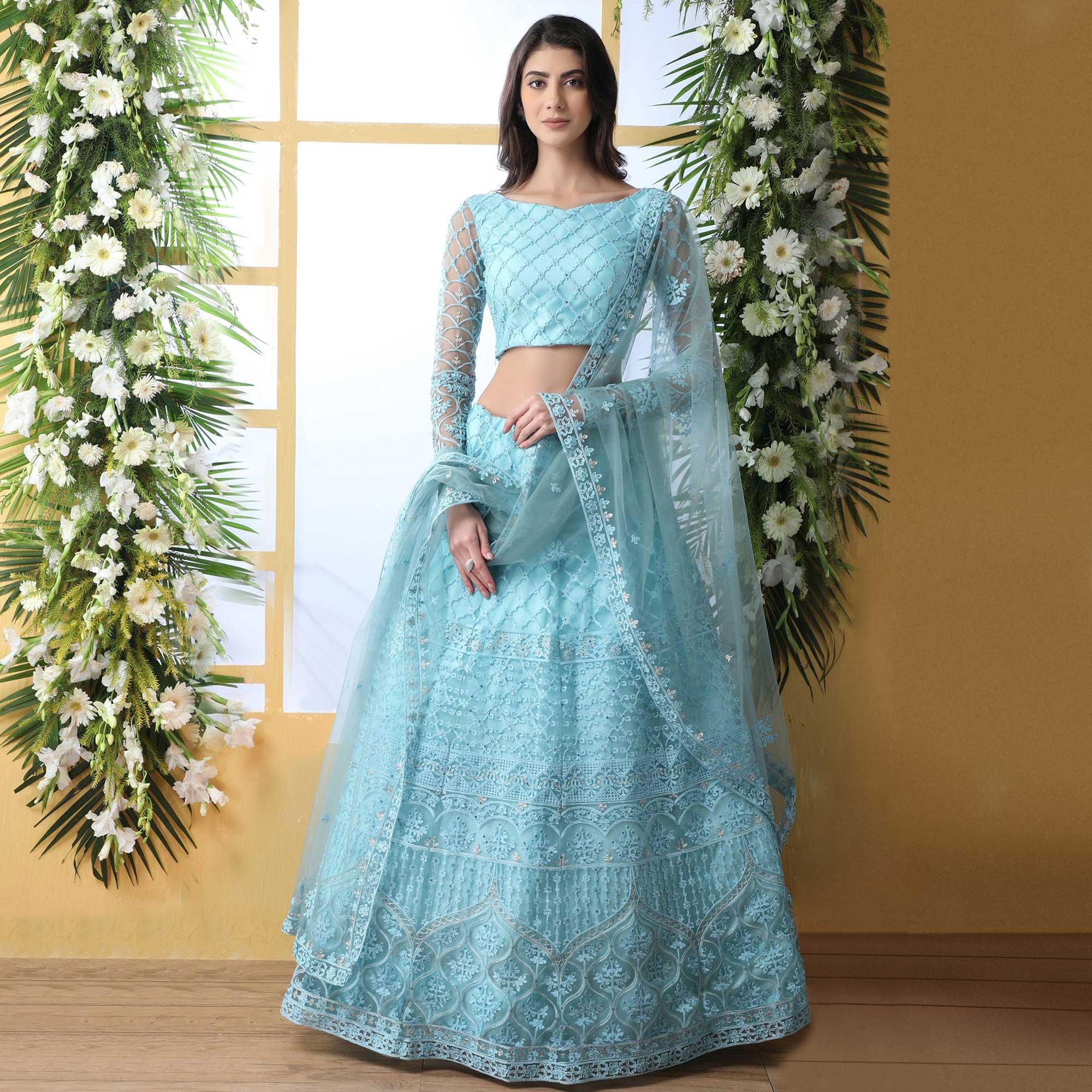 Peachmode Capricious Sky Blue Colored Partywear Embroidered Netted Lehenga Choli