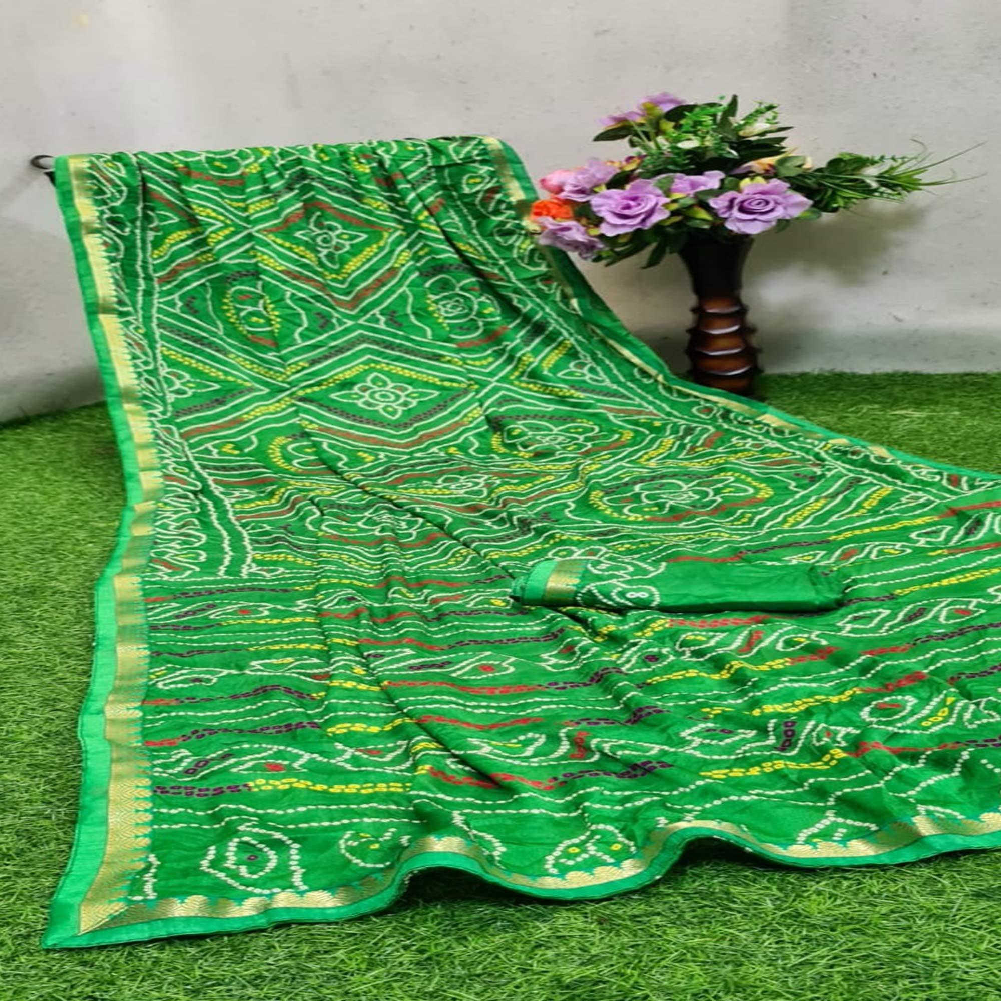 Peachmode Jazzy Green Colored Festive Wear Woven Moss Georgette Saree